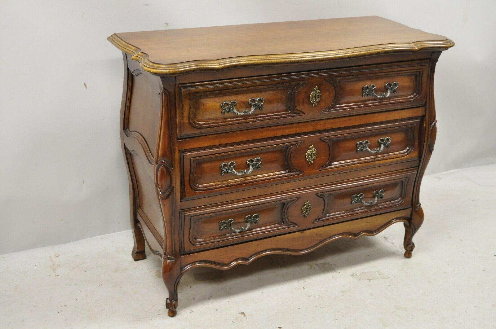 French Provincial Louis XV Country Style Sienna Cherry Bombe Commode Chest Dresser. Item features panel carved sides, solid wood construction, beautiful wood grain, nicely carved details, 3 dovetailed drawers, cabriole legs, solid brass hardware,