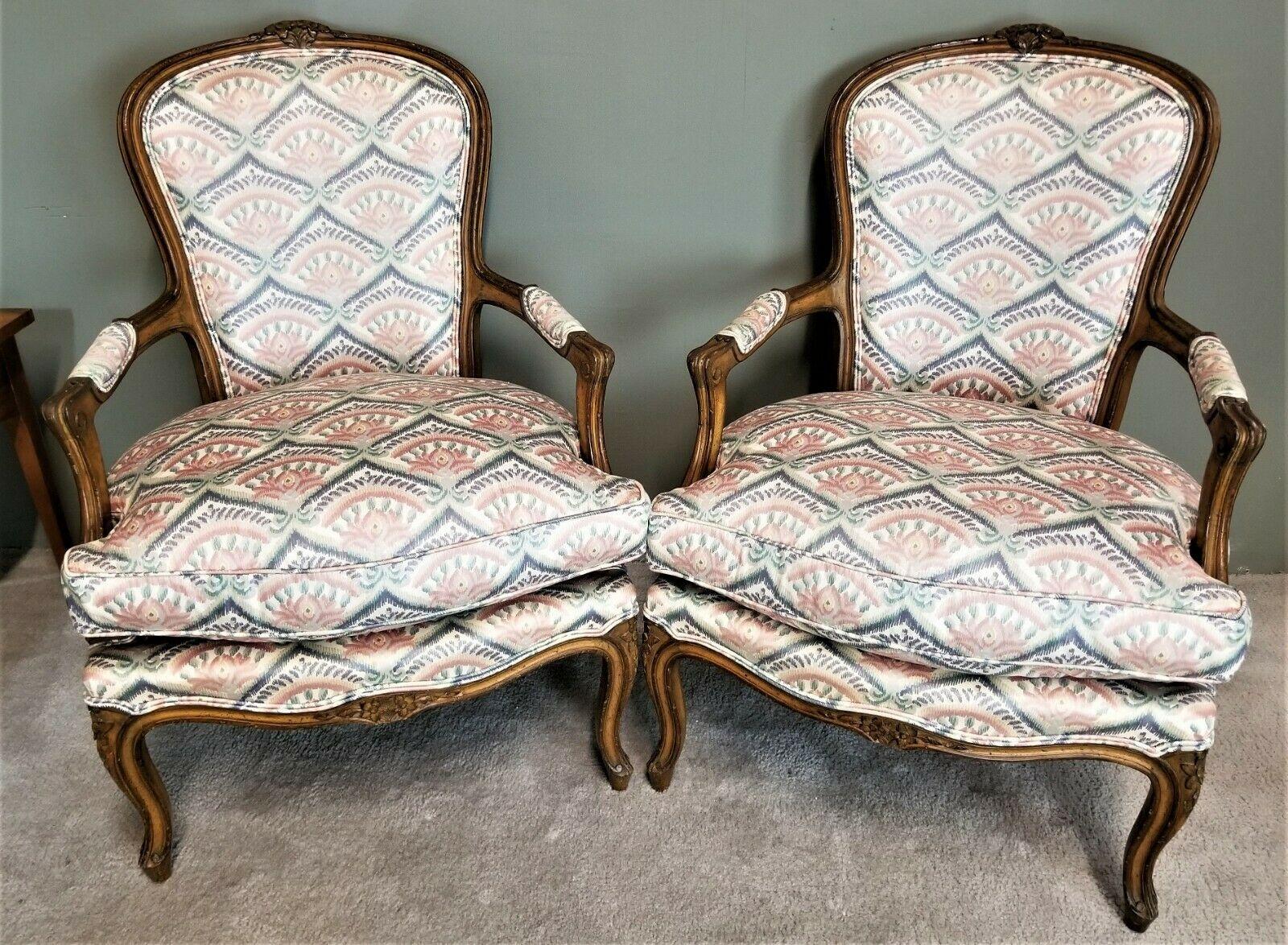 Offering One Of Our Recent Palm Beach Estate Fine Furniture Acquisitions Of A 
Beautiful Pair of Vintage French Provincial Louis XV Hand-Carved Wood Fauteuil Armchairs

With spring-supported seats, and hand-carved accents.

Approximate Measurements