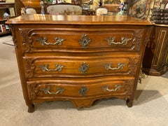 French Provincial Louis XV style carved walnut commode 18 th century