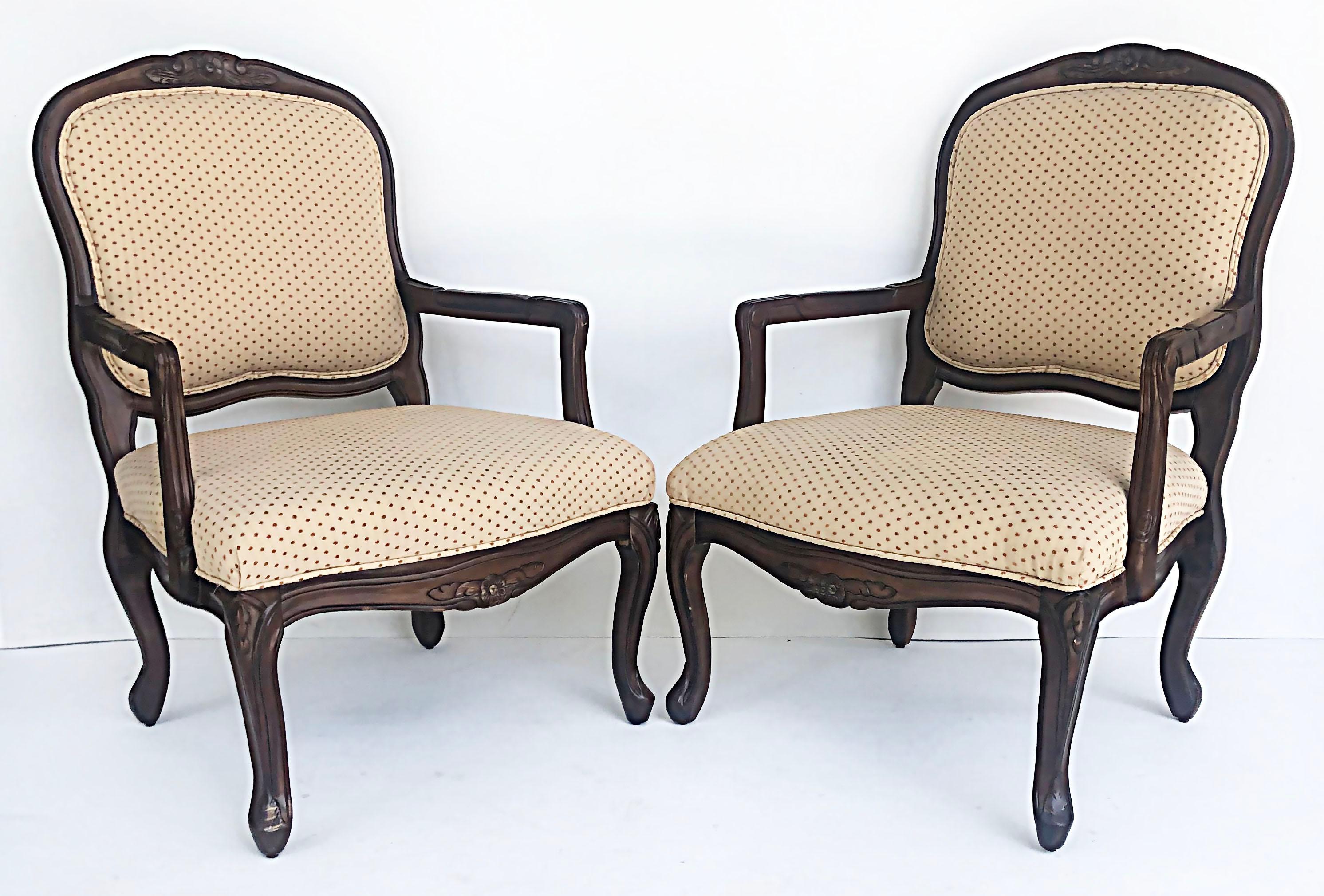 French Provincial Louis XV Style Fauteuils with Cabriole legs

Offered for sale is a pair of mid- late 20th century French Provincial style Louis XV style fauteuils with cabriole legs. These armchairs are substantial and are a large comfortable