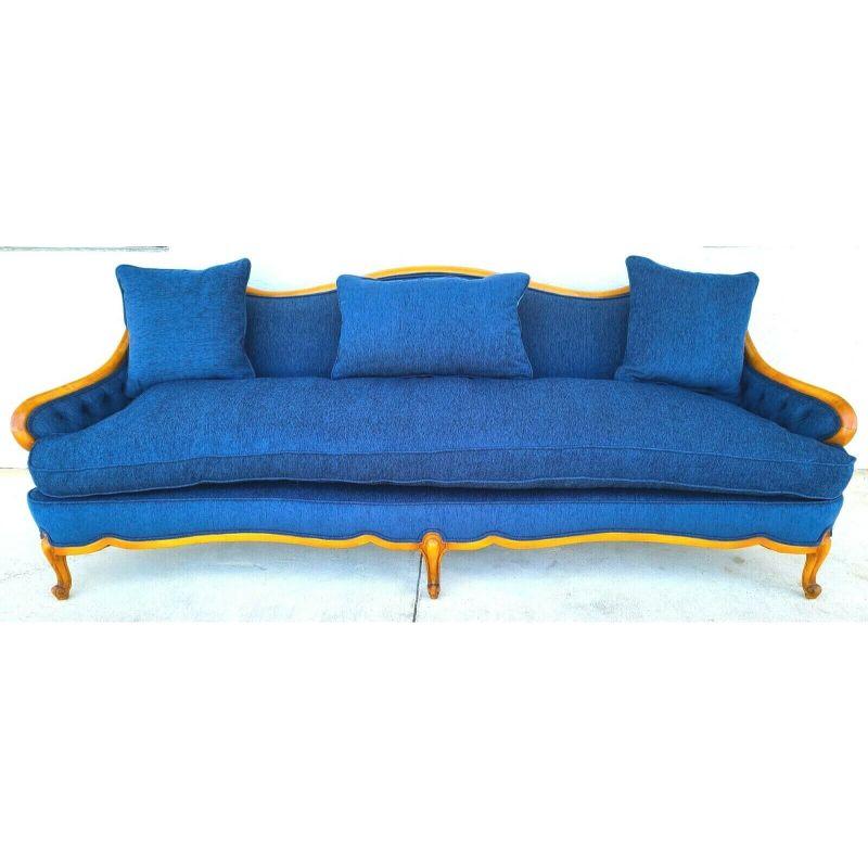 Offering one of our recent palm beach estate fine furniture acquisitions of A 
French Provincial Louis XV Style Sofa with Serpentine Carved Back
Featuring Cabriolet legs ending in Escargot carvings and 3 throw pillows

Approximate Measurements