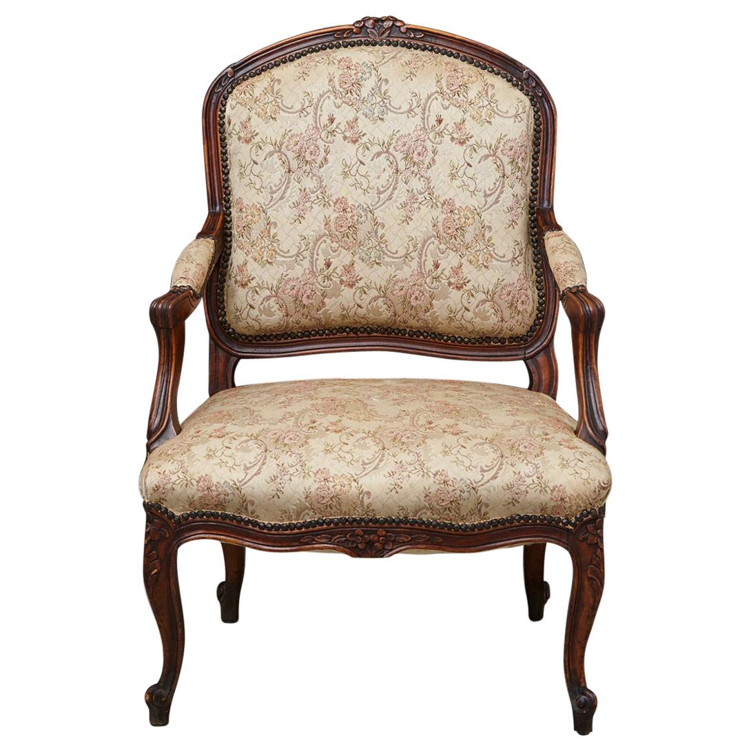 French Provincial Louis XV Style Walnut Fauteuil with Nailhead Trim, circa 1930s For Sale