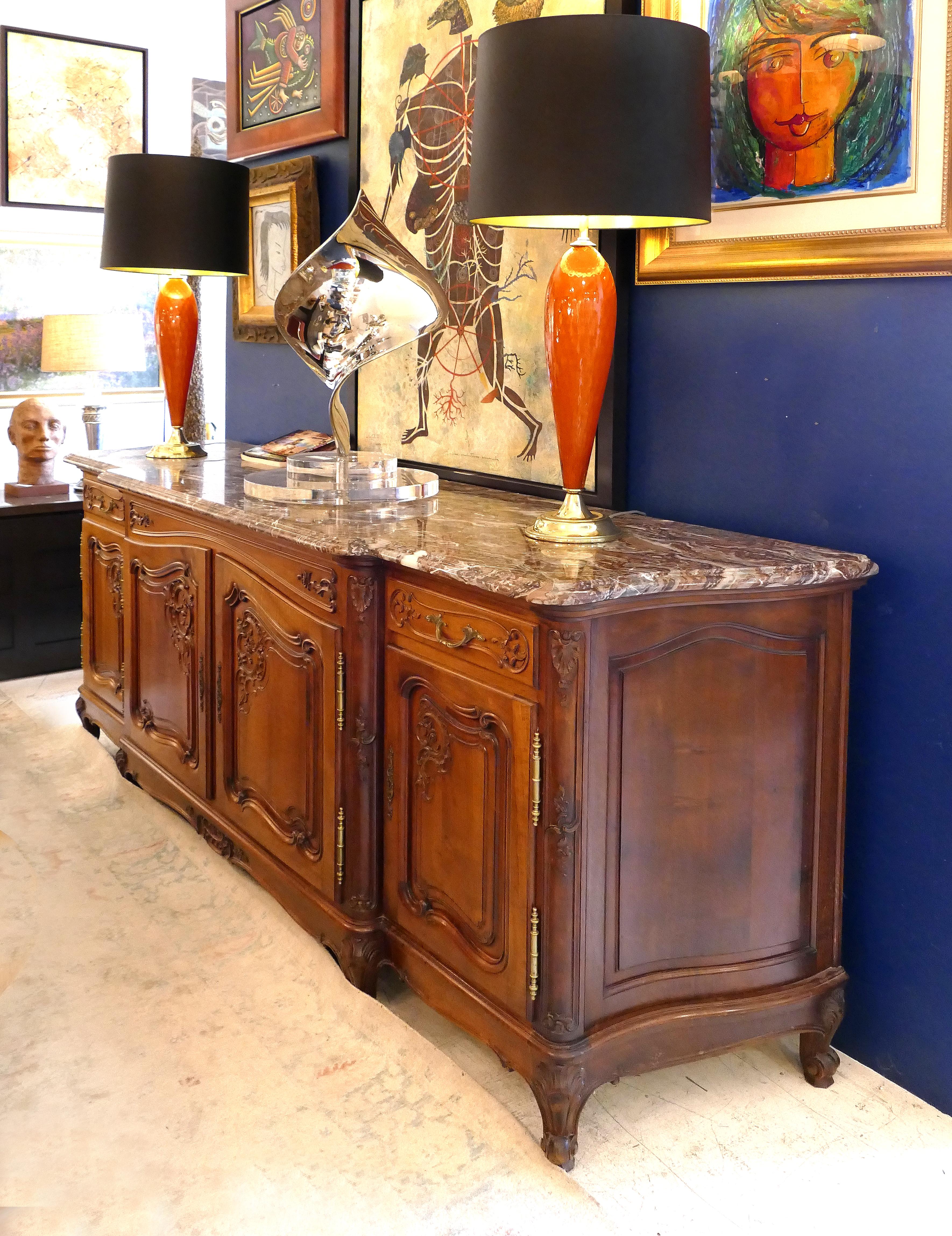 French Provincial marble-top buffet sideboard in carved walnut

Offered for sale is an impressive and substantial French provincial carved walnut buffet sideboard with an ornate marble top. This large, beautifully carved cabinet provides a great