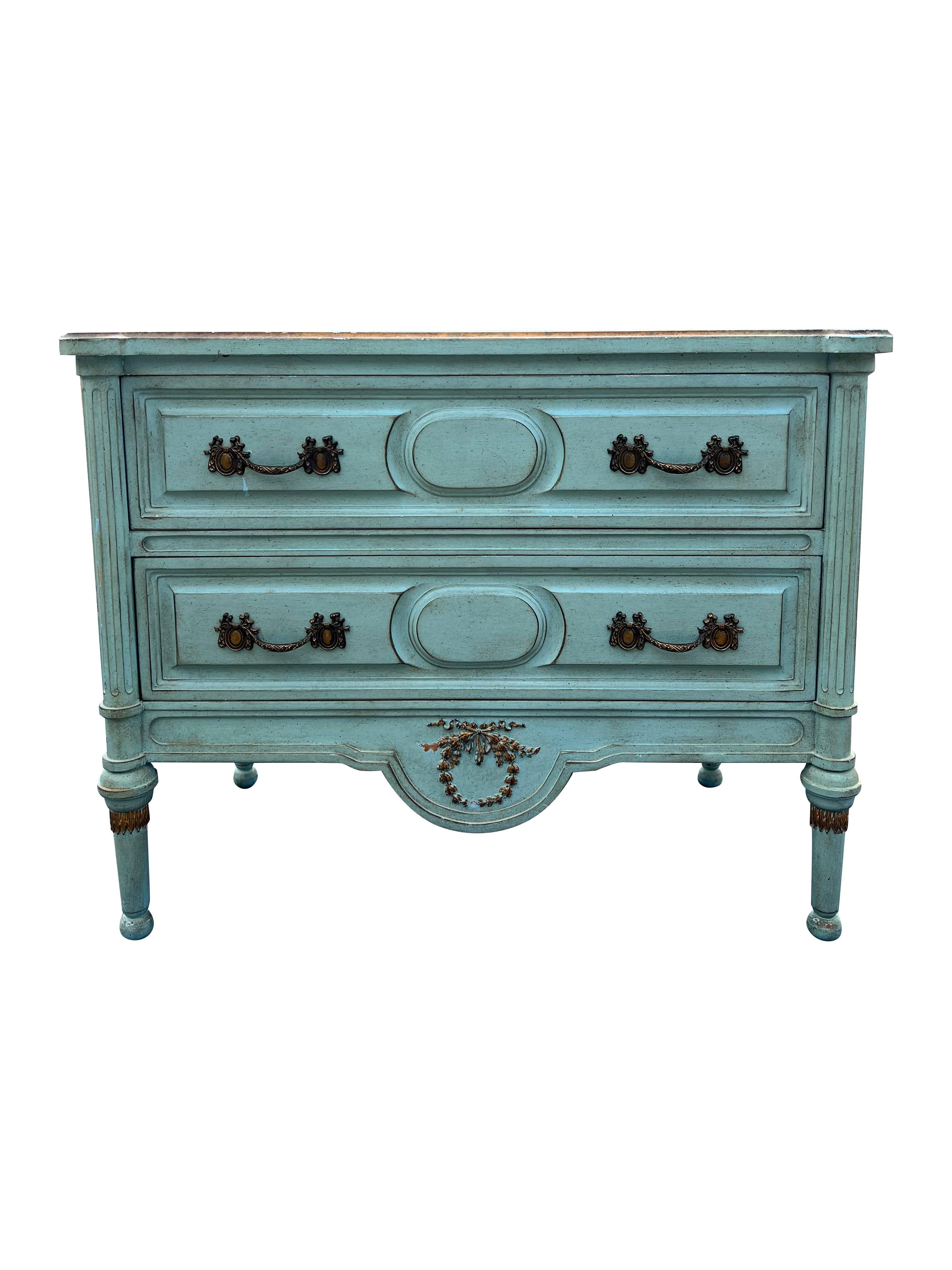 Vintage French Provincial Dresser or Credenza in French Blue with Gold Hardware.

Elevate your home decor with this stunning Vintage French Provincial Dresser or Credenza. This unique piece combines classic French Provincial style with a modern