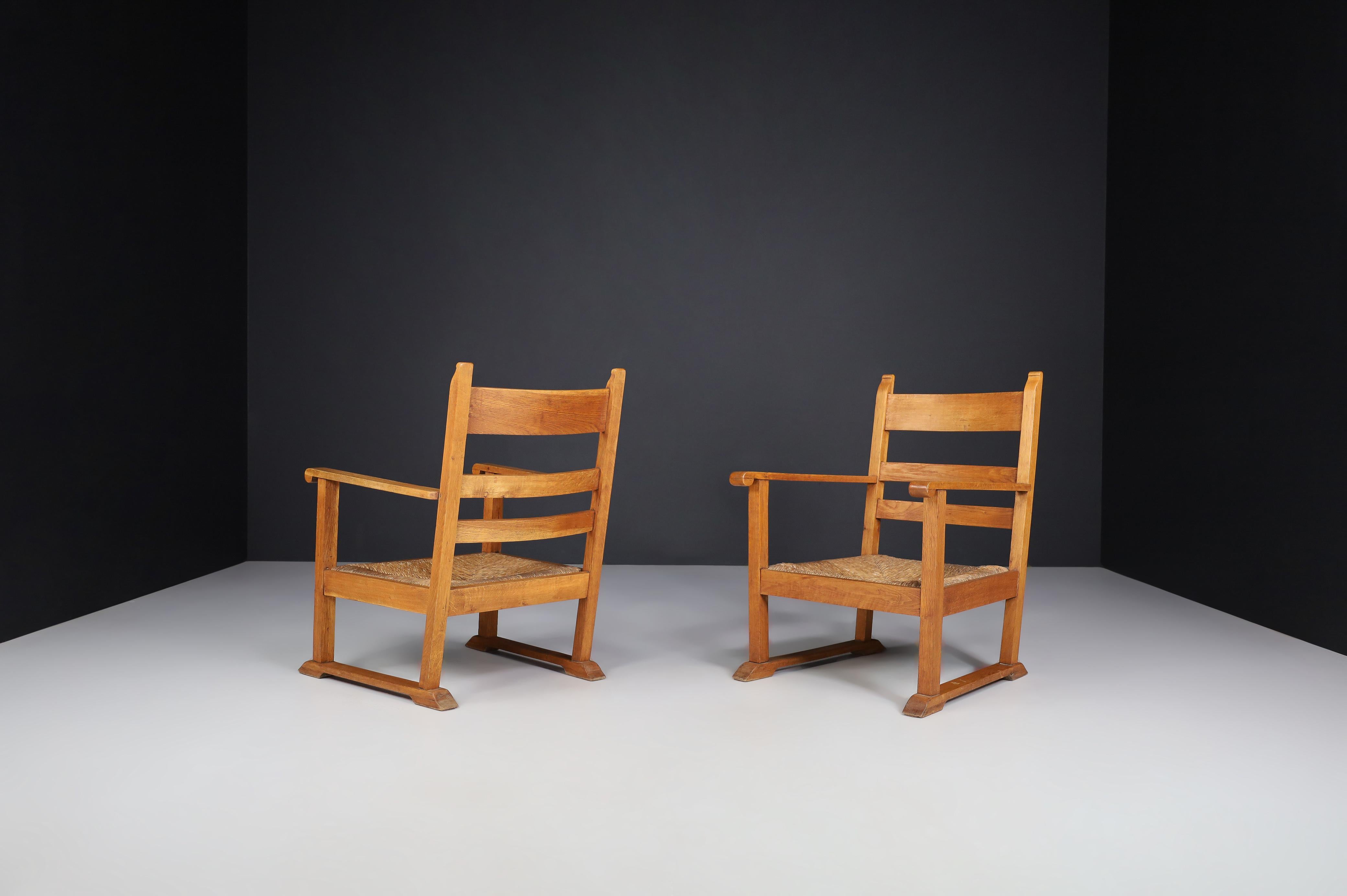 French Provincial Oak and Rush Armchairs, France 1940s In Good Condition For Sale In Almelo, NL
