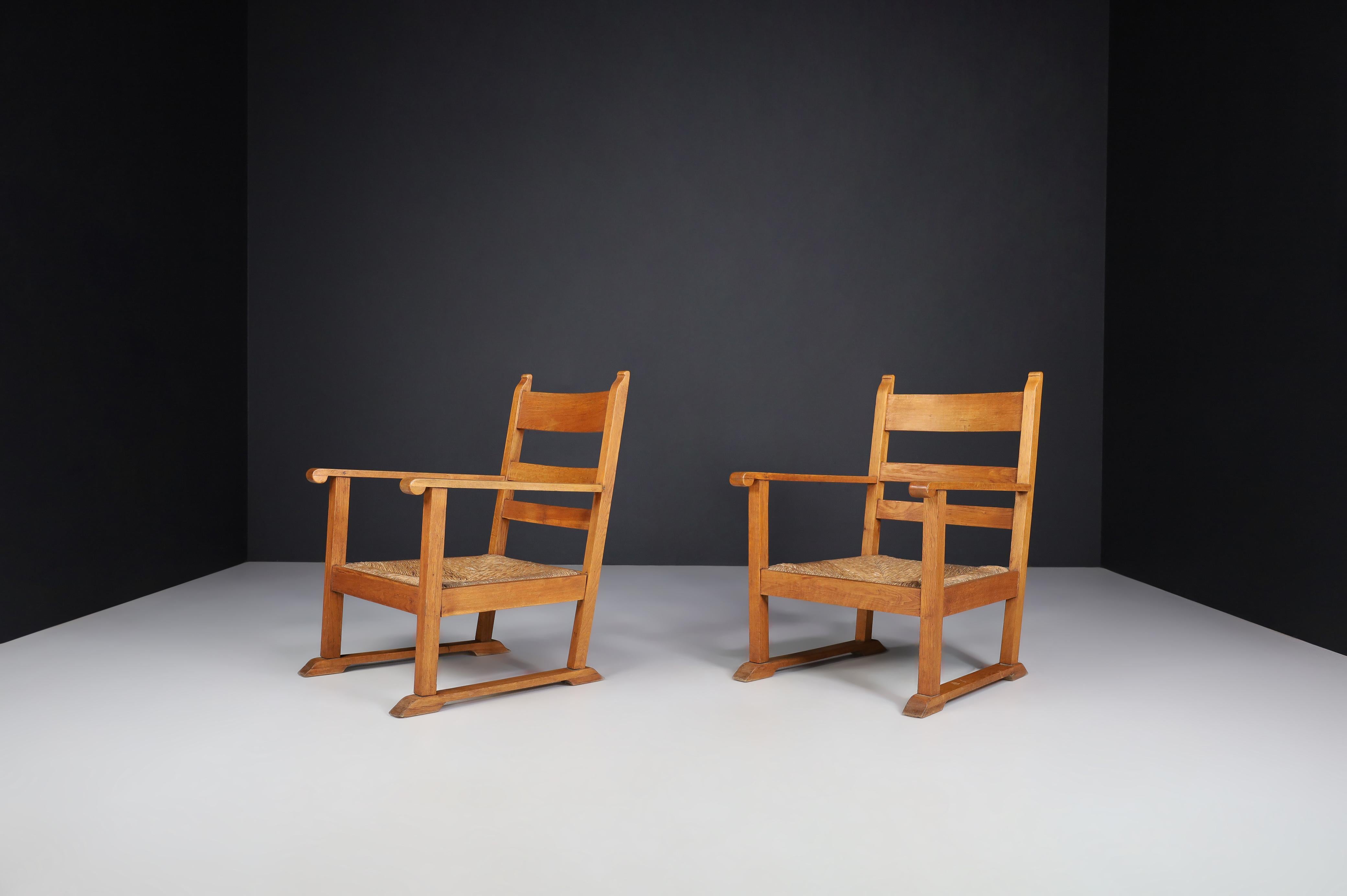 20th Century French Provincial Oak and Rush Armchairs, France 1940s For Sale