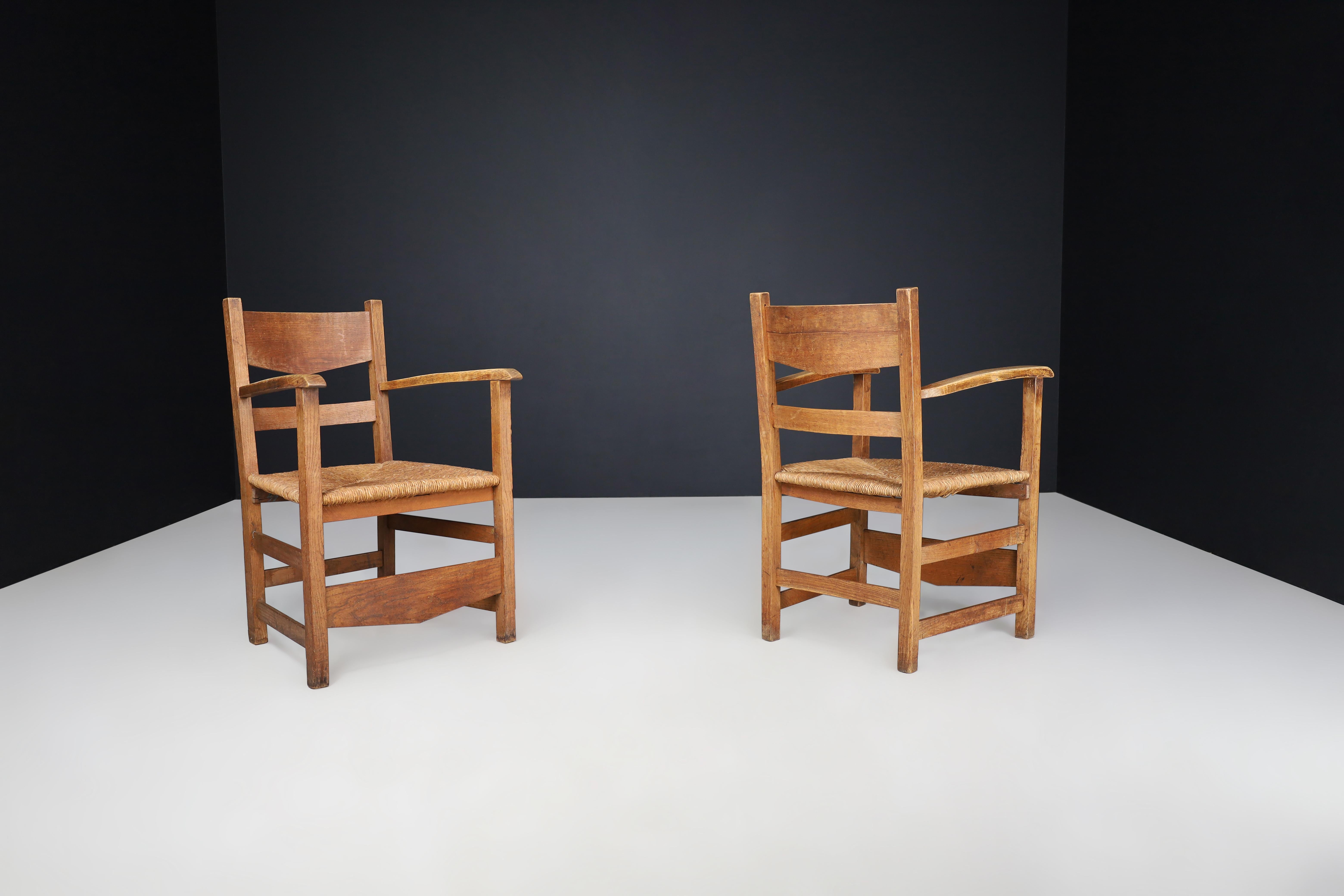 French Provincial Oak and Rush Armchairs, France 1950s In Good Condition For Sale In Almelo, NL