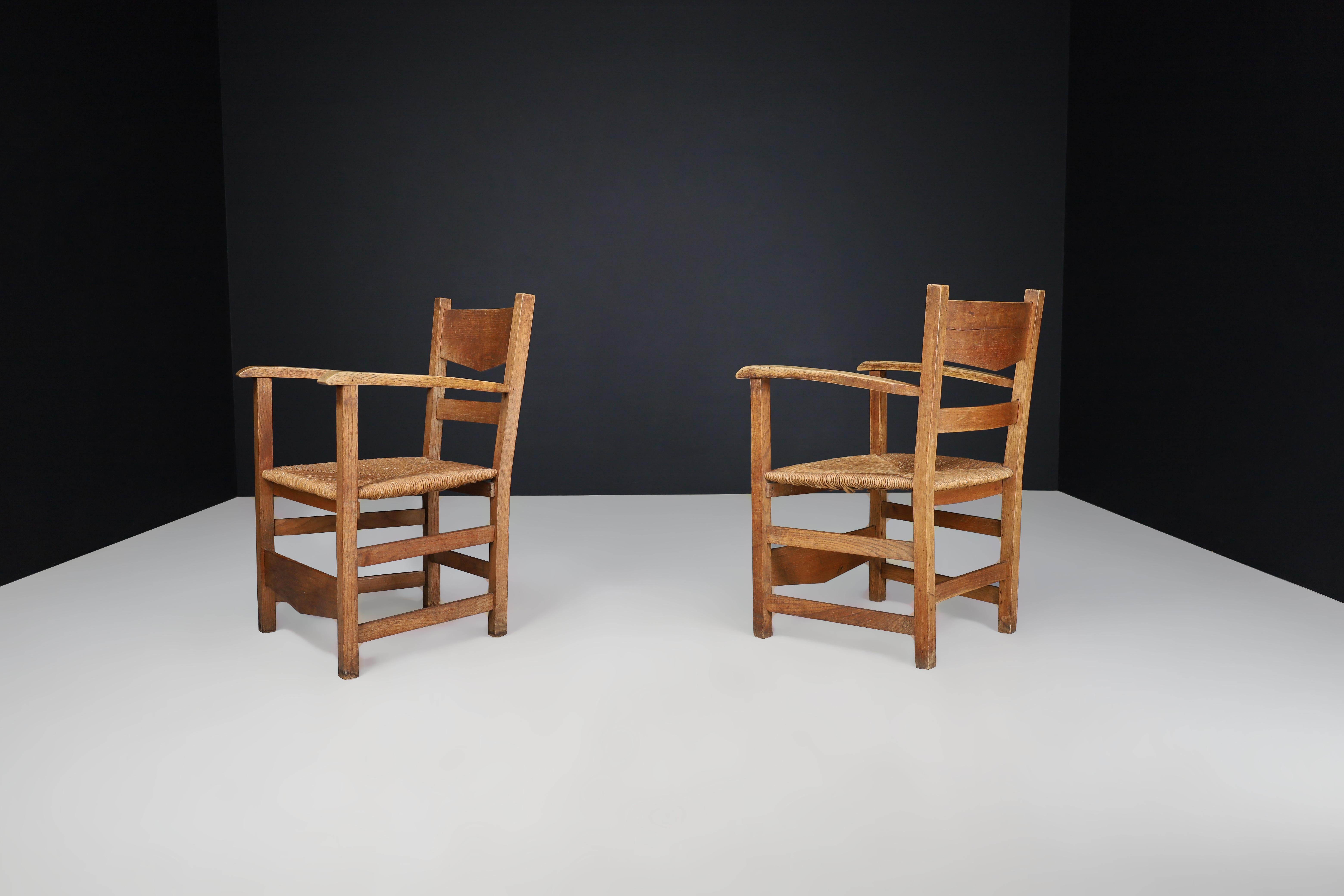 20th Century French Provincial Oak and Rush Armchairs, France 1950s For Sale