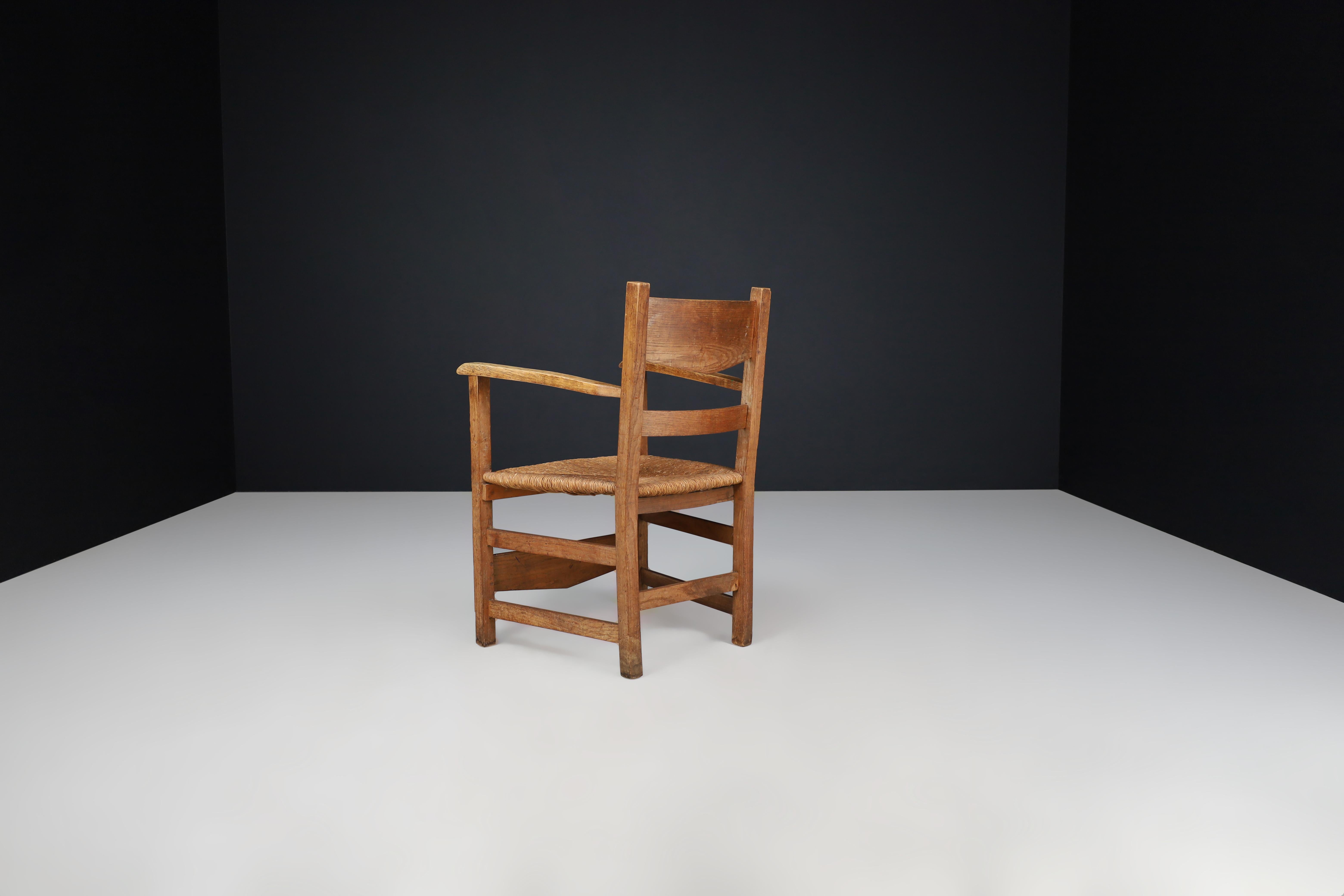 French Provincial Oak and Rush Armchairs, France 1950s For Sale 4