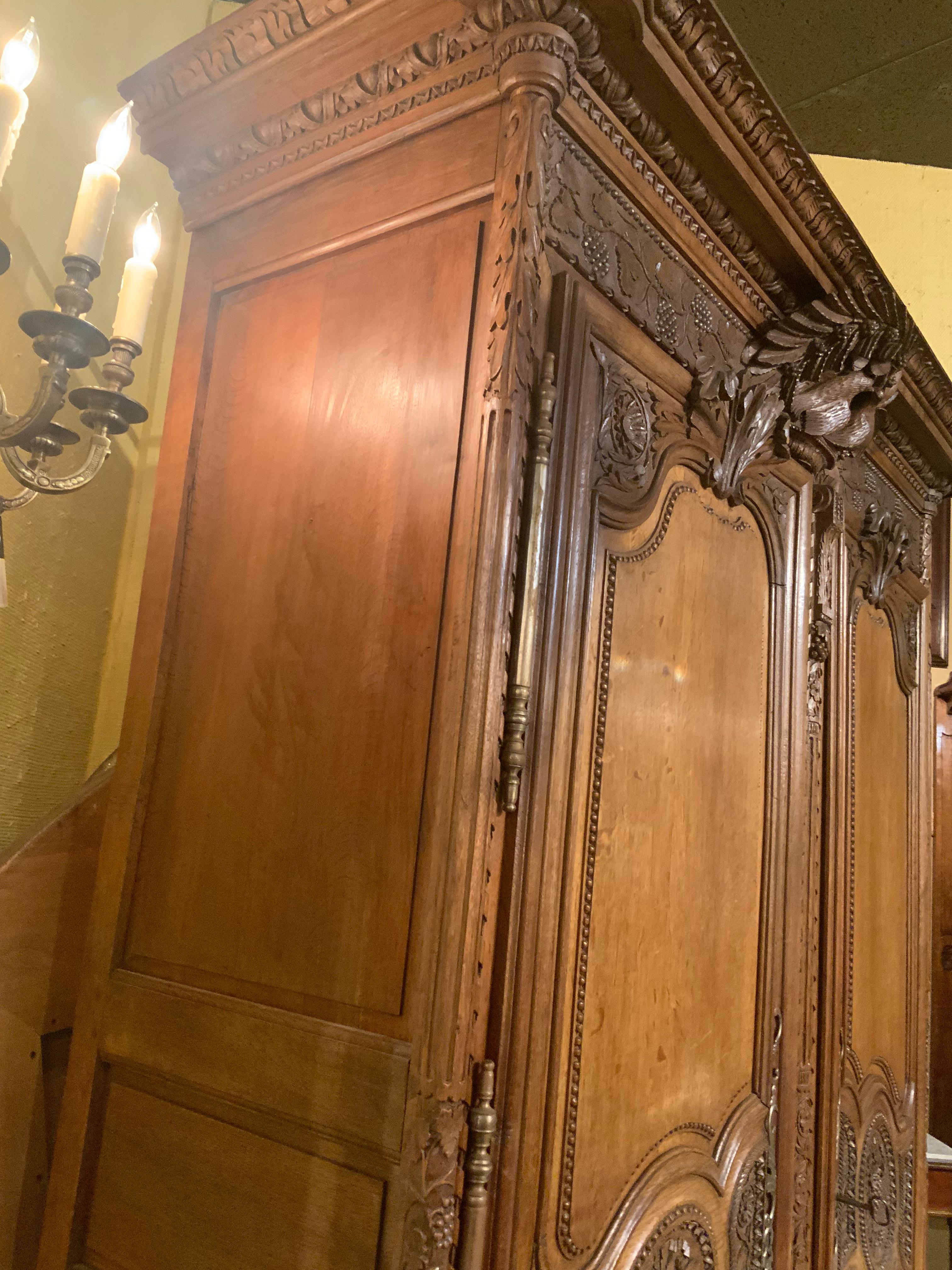 French provincial oak wedding armoire. 19 th c. With carved love birds 4