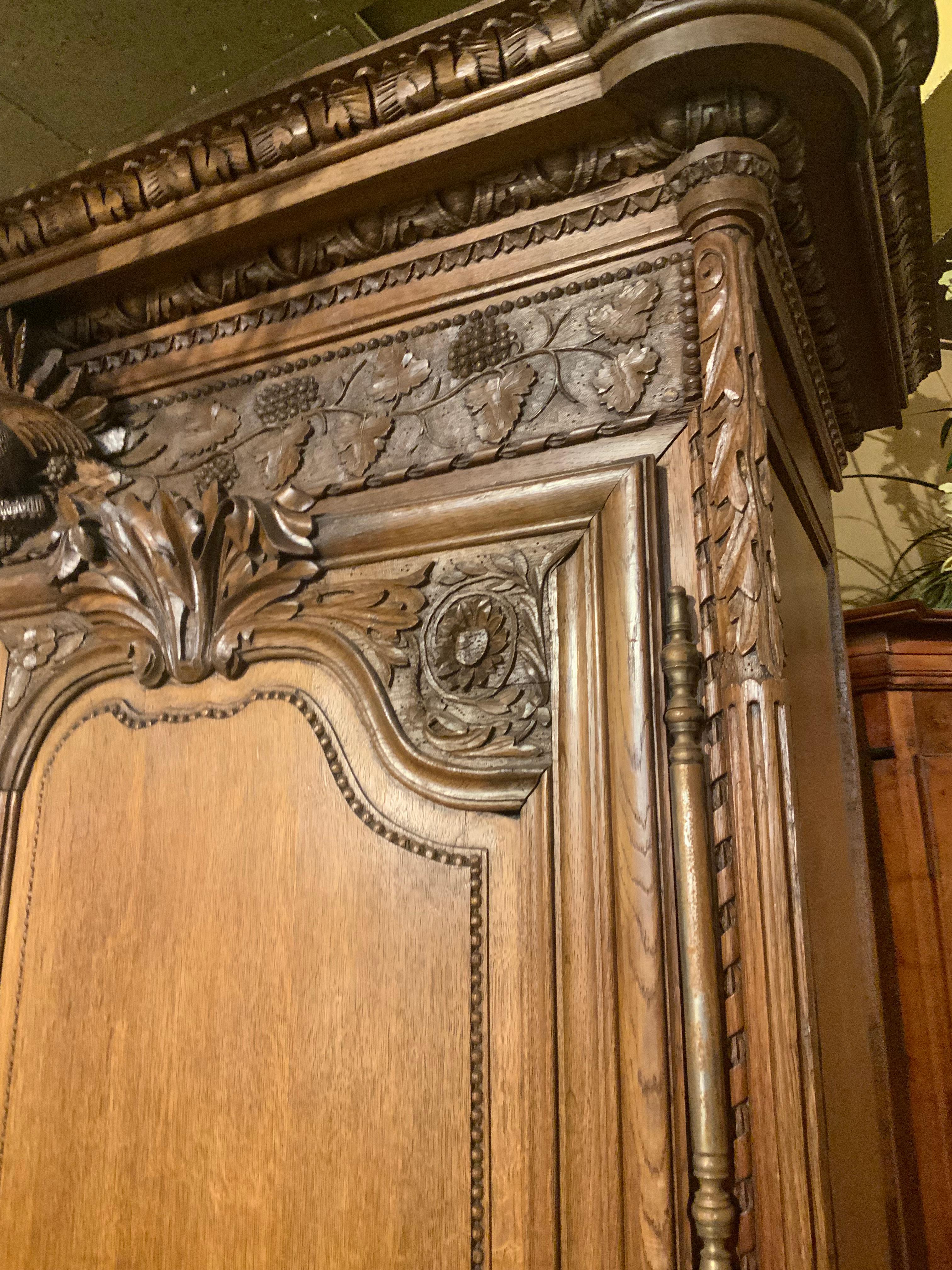 French provincial oak wedding armoire. 19 th c. With carved love birds 2