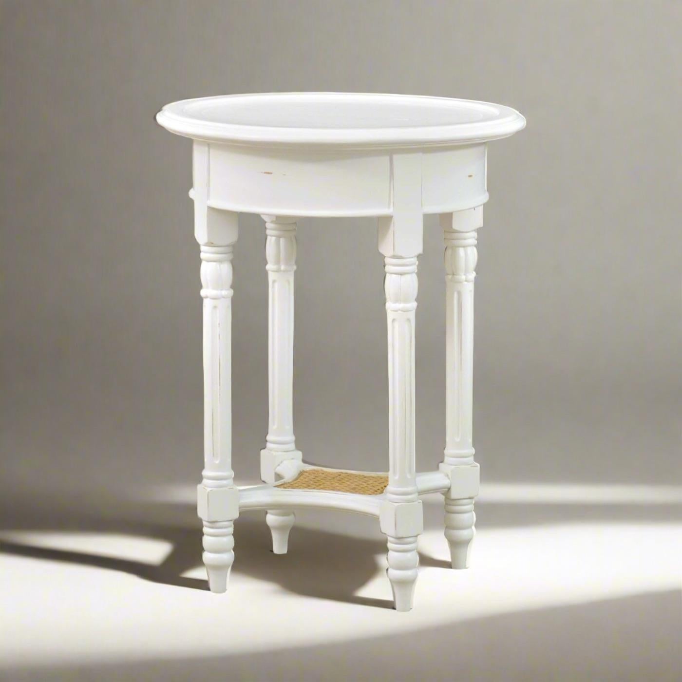 This piece combines timeless 18th-century French Provincial design with modern functionality. The lightly distressed Harvest White painted finish and intricate details make it a standout centerpiece that enhances any decor style.

The molded round