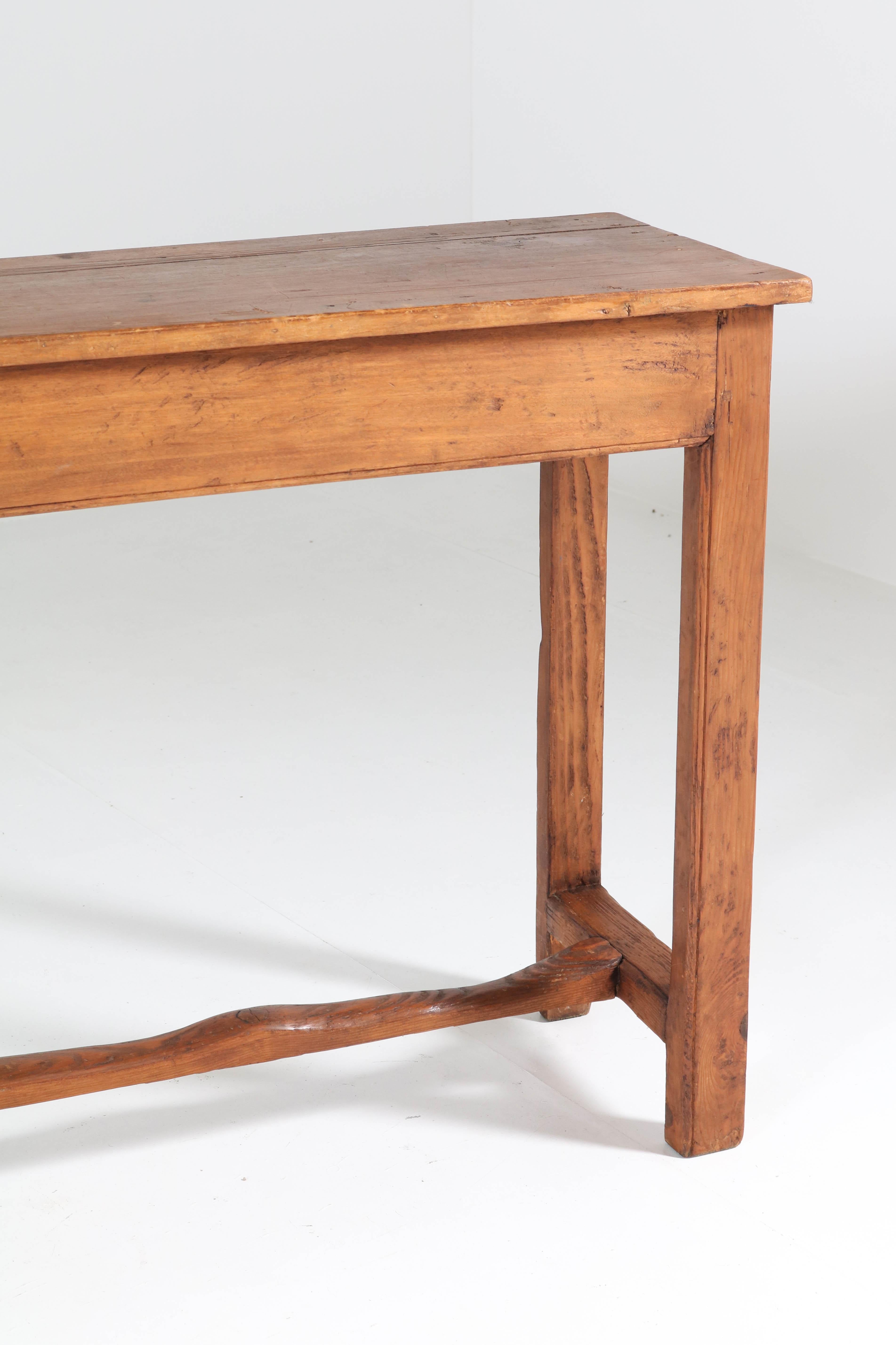 Stunning and rare French Provincial side-table or work table.
Large size and manufactured circa 1890.
Solid pine.
In good original condition with minor wear consistent with age and use,
preserving a beautiful patina.