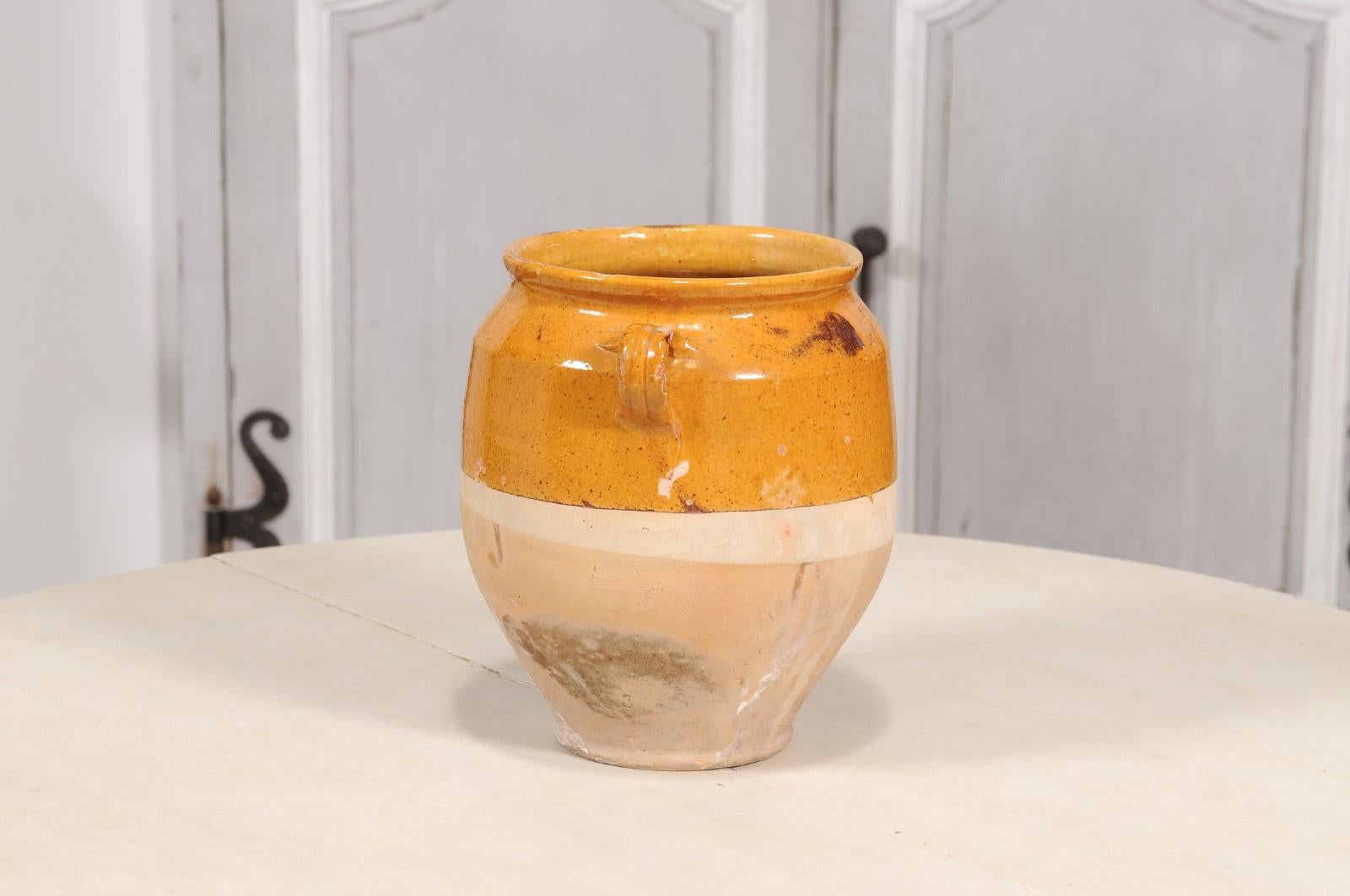 20th Century French Provincial Pot à Confit Pottery with Warm Yellow Glaze and Two Handles For Sale