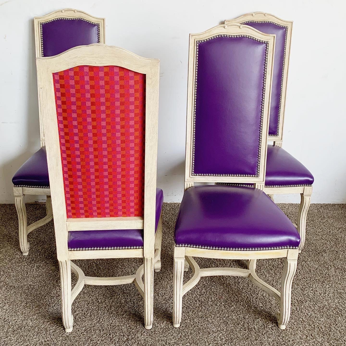 Introducing the French Provincial Purple Vinyl Chairs - Set of 4, a blend of classic elegance and bold modern design.

Rich purple vinyl upholstery for a luxurious touch.
Beautifully platted back showcases intricate craftsmanship.
Delicate curves