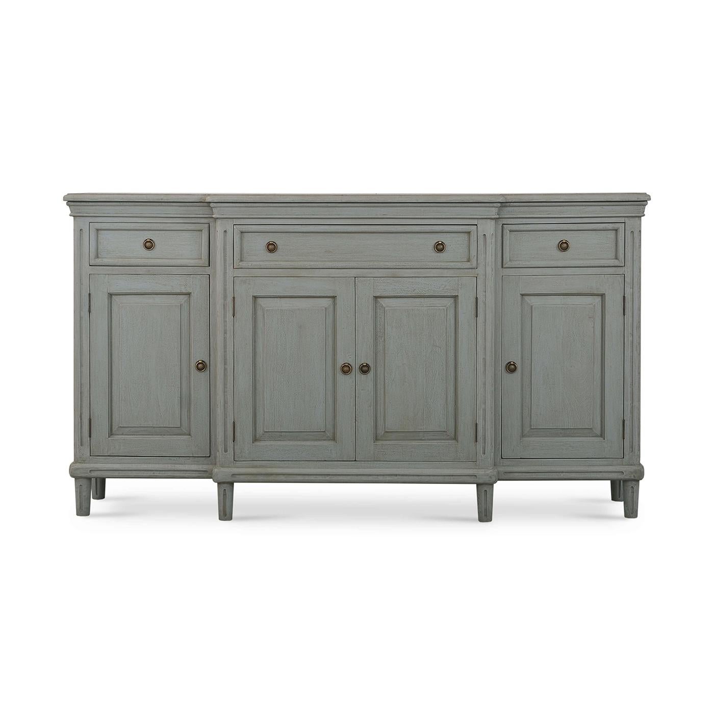  Perfectly blending vintage aesthetics with practical functionality, this credenza is finished in a lightly distressed hand-rubbed Charleston Grey painted finish. The elegant gray finish brings a refined and classic touch to any room, enhancing your