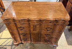 French Provincial Style Carved Fruitwood Chest with Arbalete Form Drawers