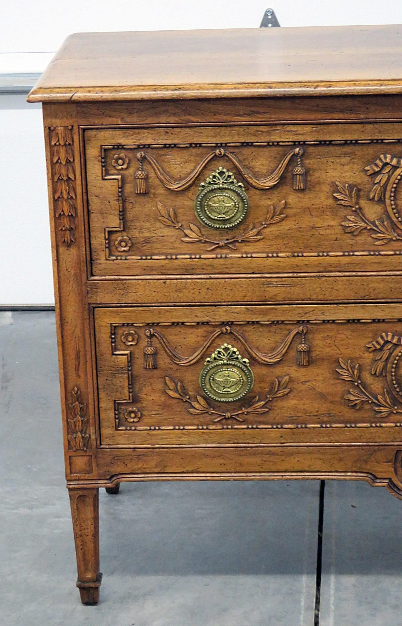 French Provincial style distressed finished 2-drawer commode with bronze hardware.