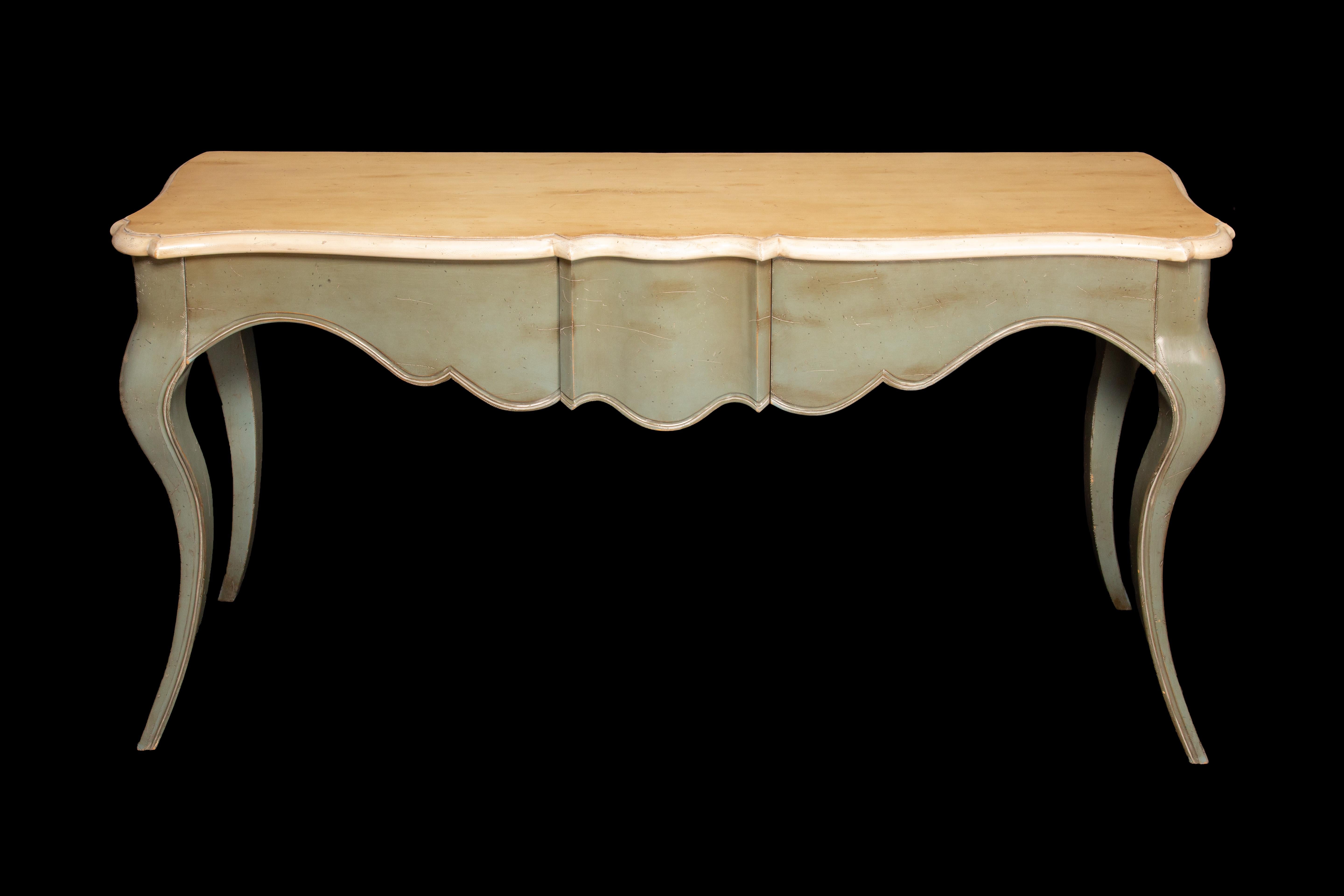 French Provincial style console with three dovetail drawers. Attributed to Grange.

Measures: 65