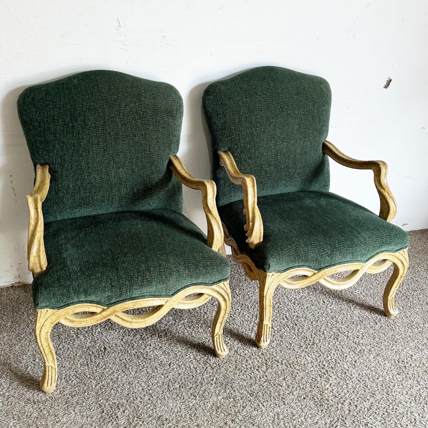 Embrace the timeless elegance of the French Provincial Green Armchairs, enhanced by a unique twisting wooden frame. These armchairs combine traditional craftsmanship with a modern twist, featuring intricately carved wooden frames and rich green