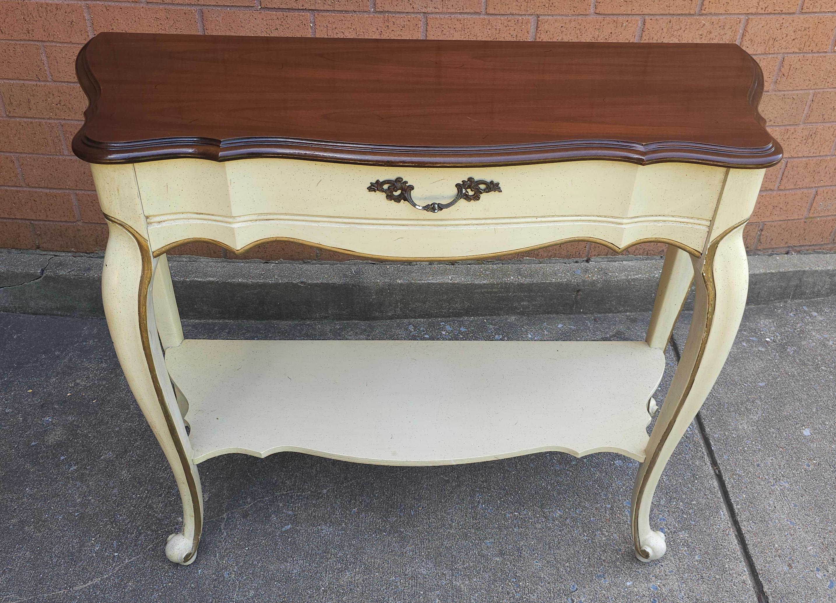 A French Provincial Style Partial Gilt And Enamel Painted Console Table. Great vintage condition. Measures 35.5
