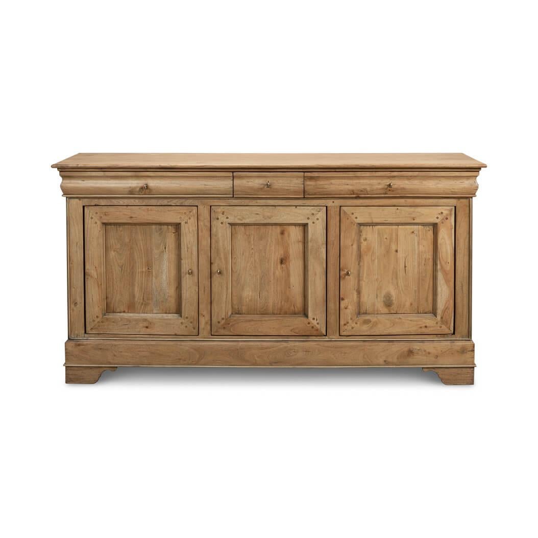 This sideboard is expertly crafted from solid walnut, known for its durability and rich grain, and is finished in a medium drift brown that highlights its natural beauty. Measuring 70 inches in width, 18 inches in depth, and 36 inches in height, it