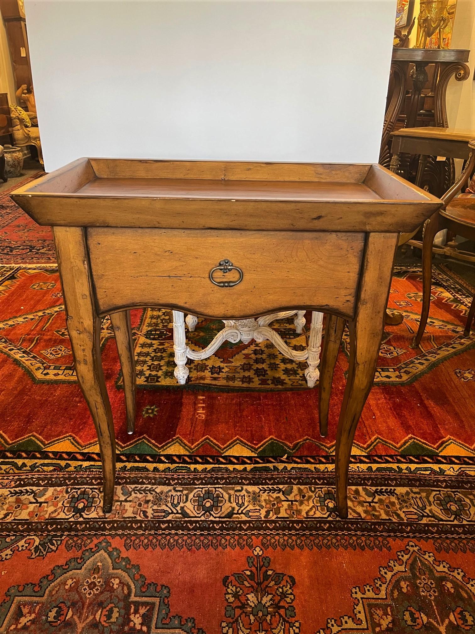 French Provincial tray top side table with a drawer, 19th century.