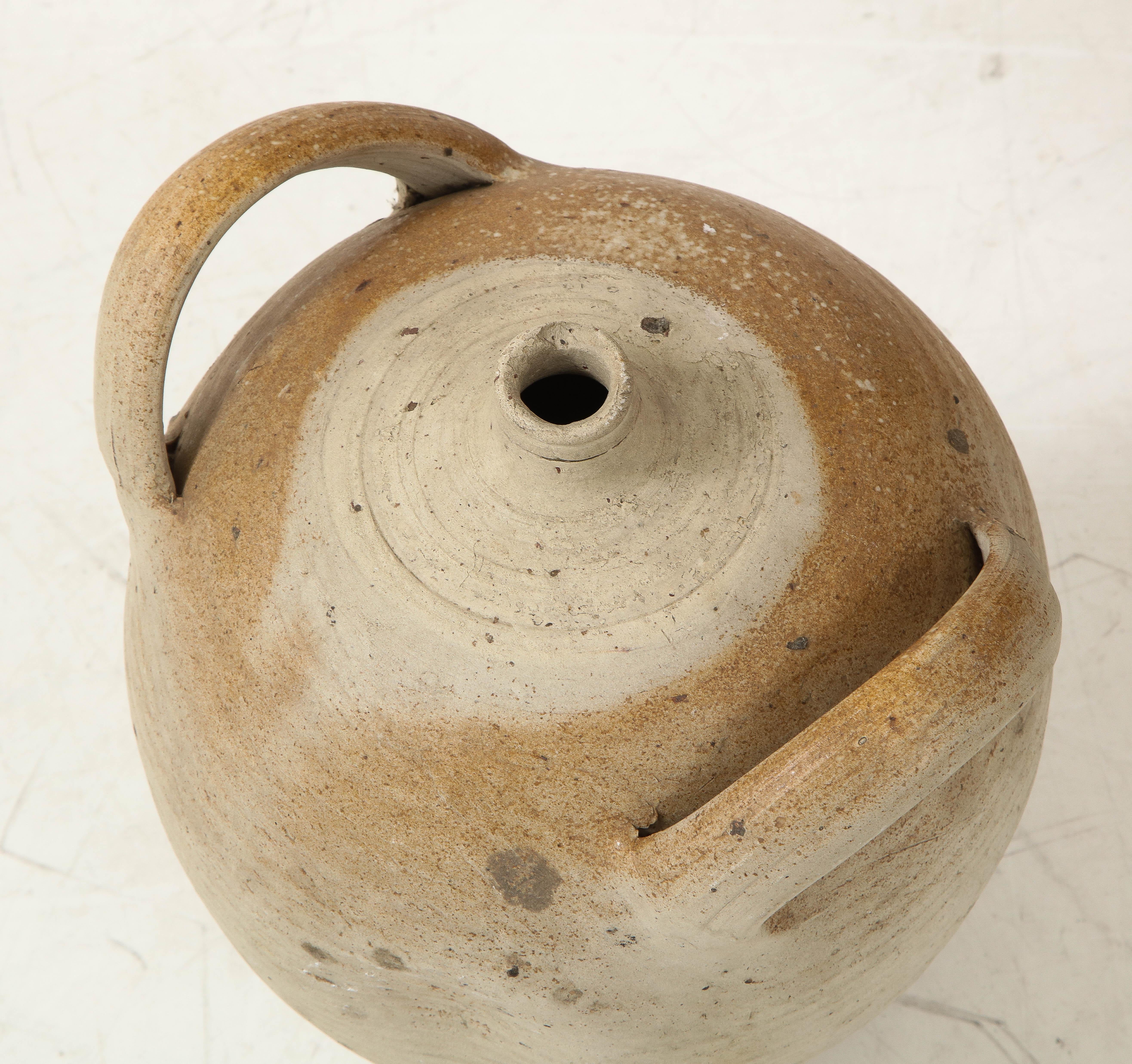 French Provincial large vintage stoneware pottery oil jug, jar, vessel or vase
France, circa 1960 
Size: 19