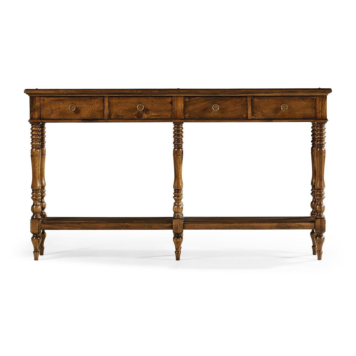 French provincial walnut parquet console table with a distressed walnut finish, four drawers and a shelf stretcher base, the top with parquetry detail motif and raised on six wonderfully turned and tapered legs.

Dimensions: 58.25