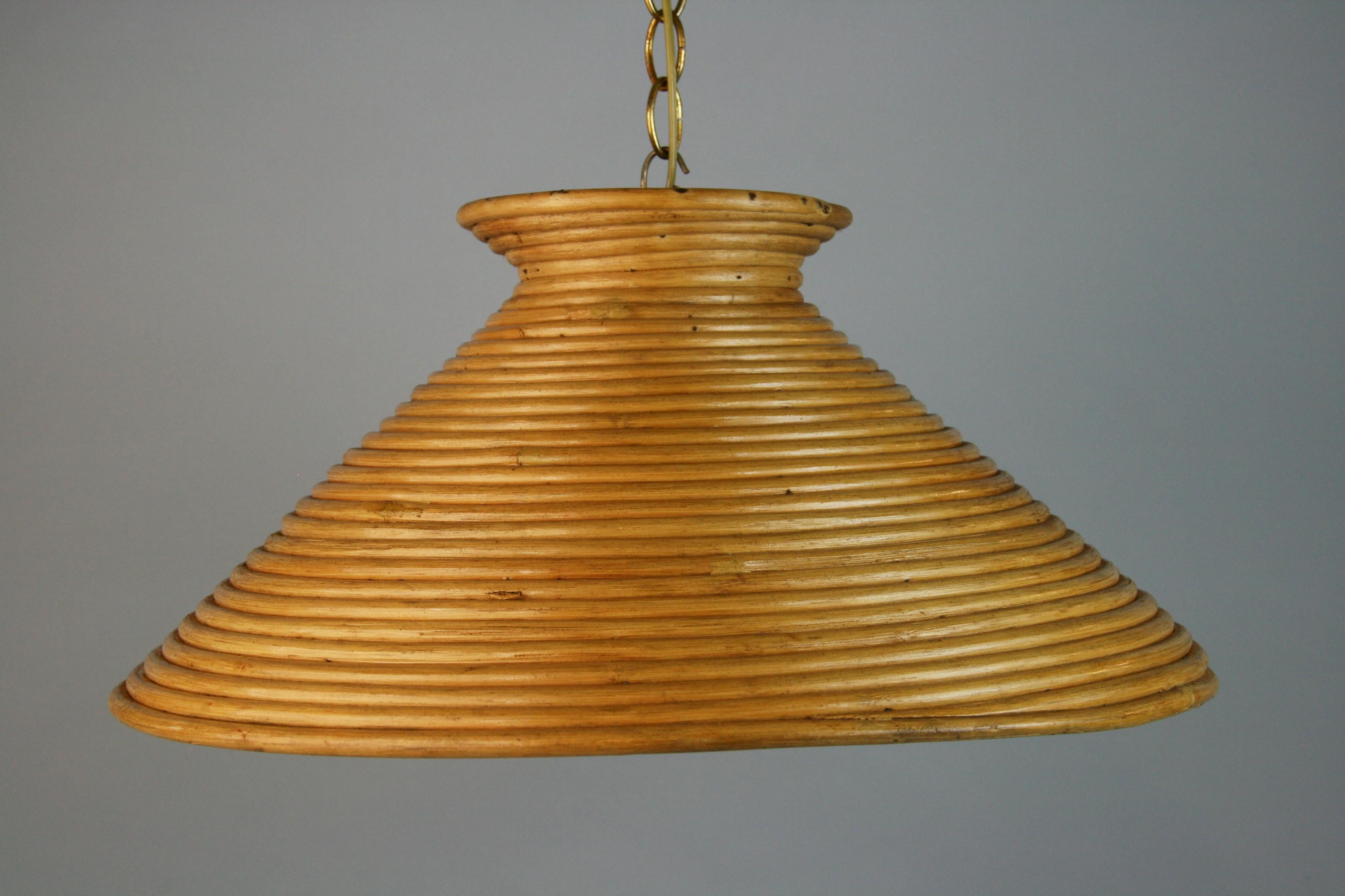 1418 French rapped reed cone pendant
Takes one Edison based bulb
Supplied with 3 feet brass chain and canopy