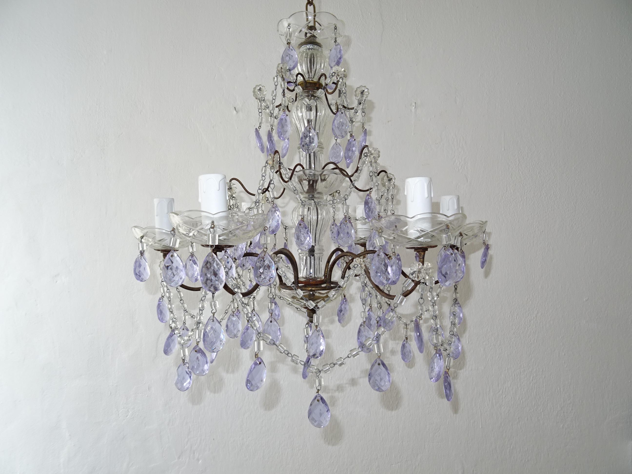 Housing six-lights, bobéches in lavender crystal prisms. Will be re-wired with certified UL US sockets for the USA and appropriate sockets for other countries and ready to hang. Free priority UPS shipping from Italy, no custom fees. Adoring 3 tiers