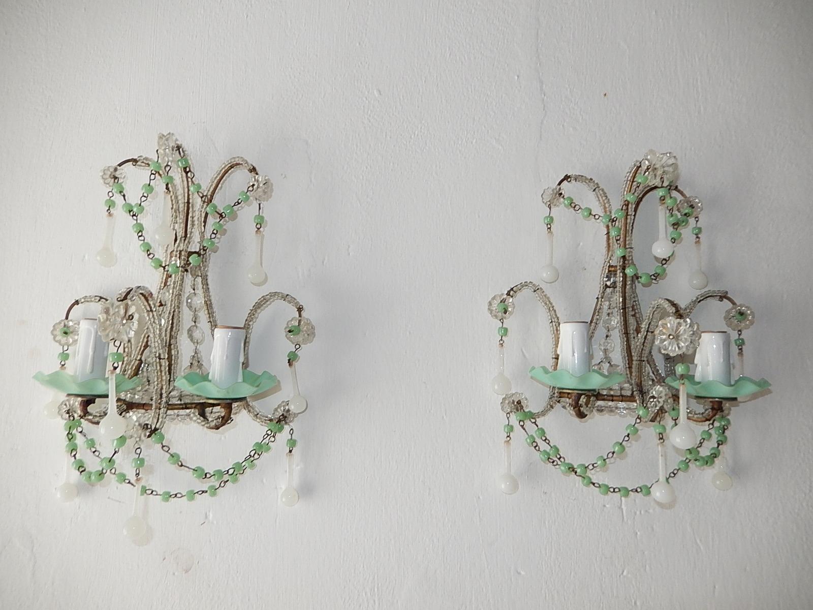 Housing two lights each. Rewired and ready to hang. Rare sea foam green ribbon cups and matching beads. Also adorning small white opaline Murano drops. Body completely beaded. Free priority shipping from Italy.