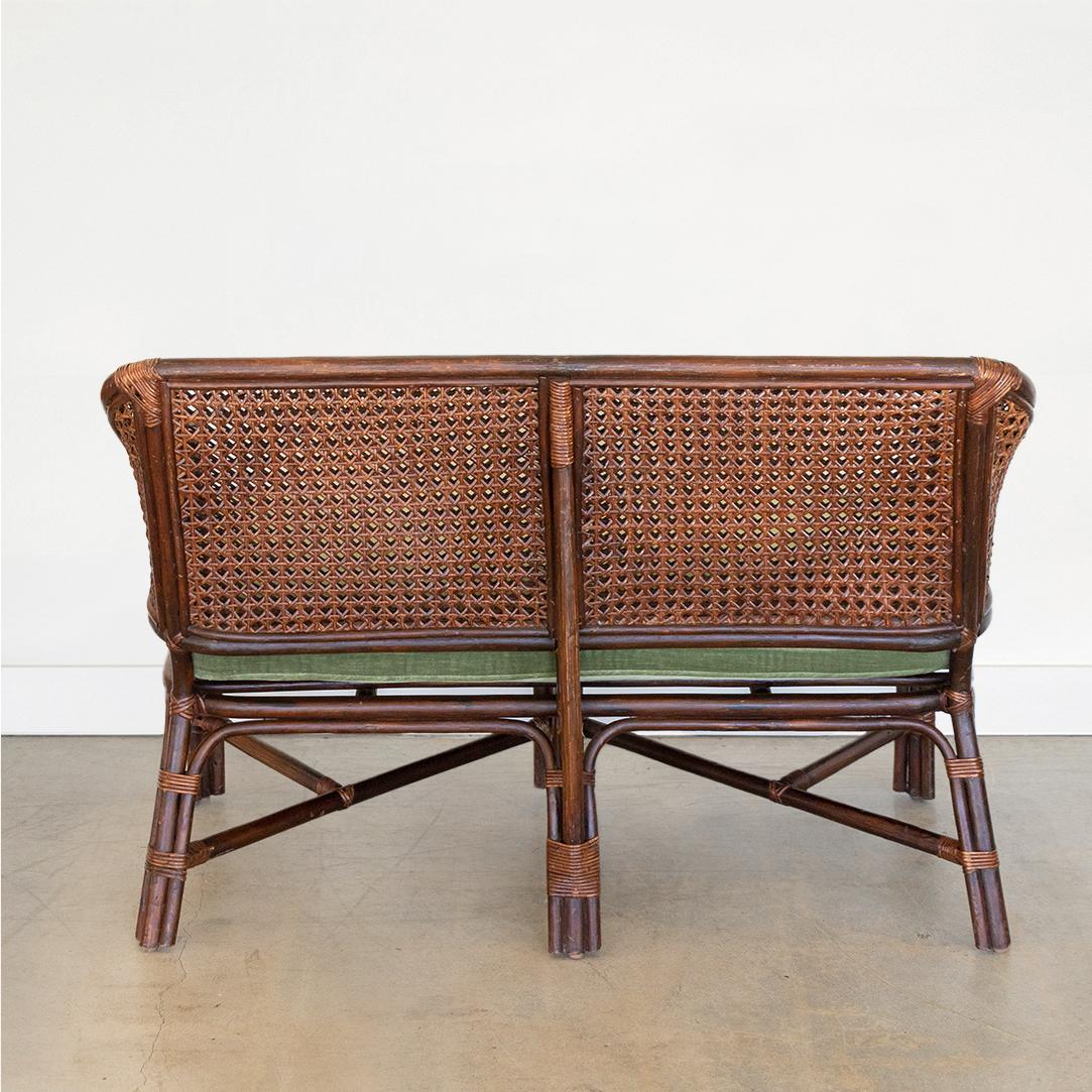 French Rattan and Cane Settee with Cushion 1