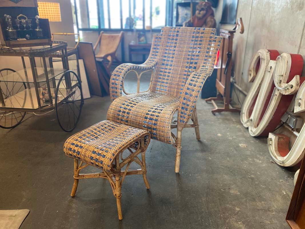 French rattan armchair with ottoman, Art Nouveau.

The armchair has a high back and wide armrests, which are made entirely of rattan weave. The beautiful curved design promises coziness and at the same time is typically French. The special and