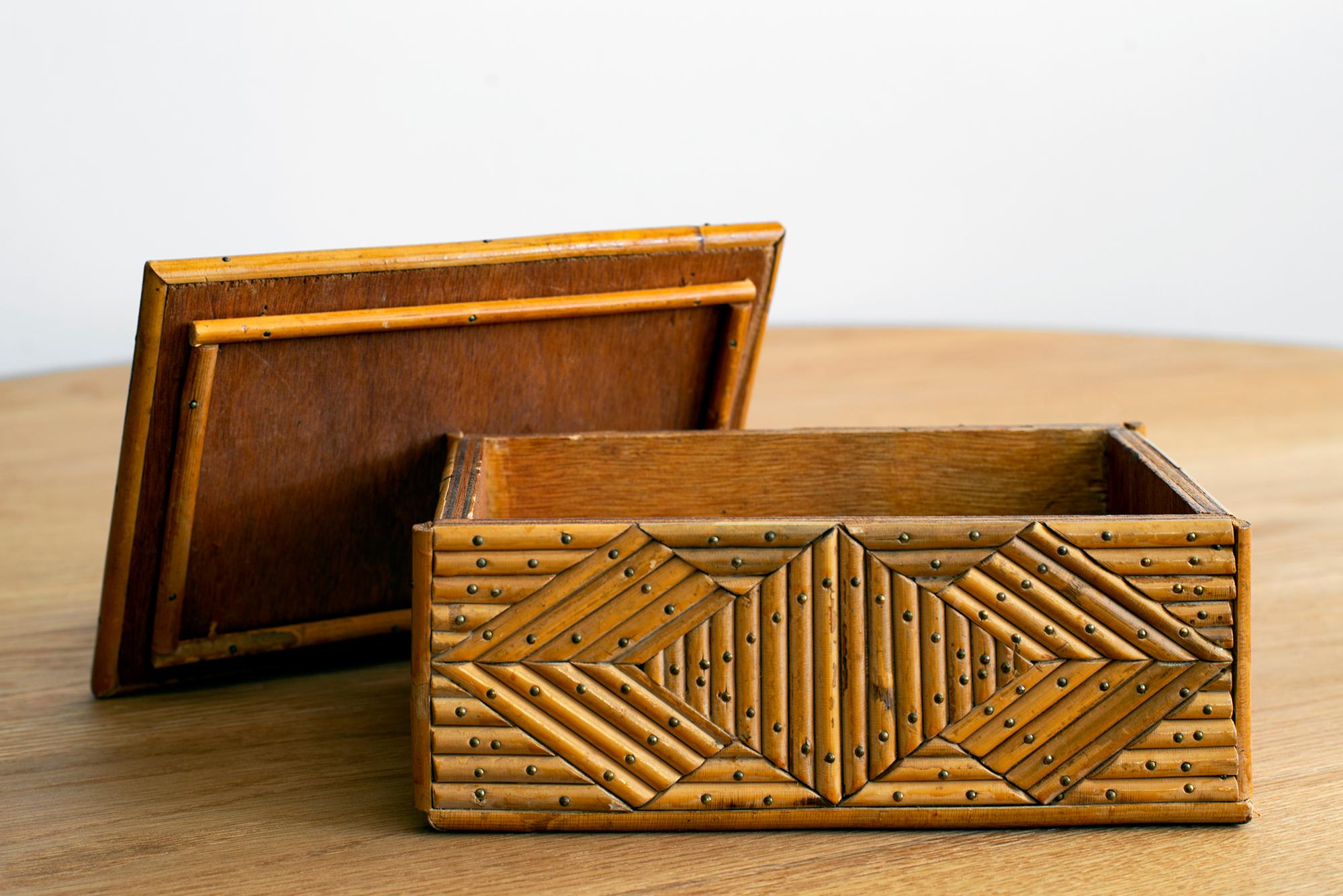 French rattan box with intricate pattern and incredible stud detail,
circa 1940s.

  