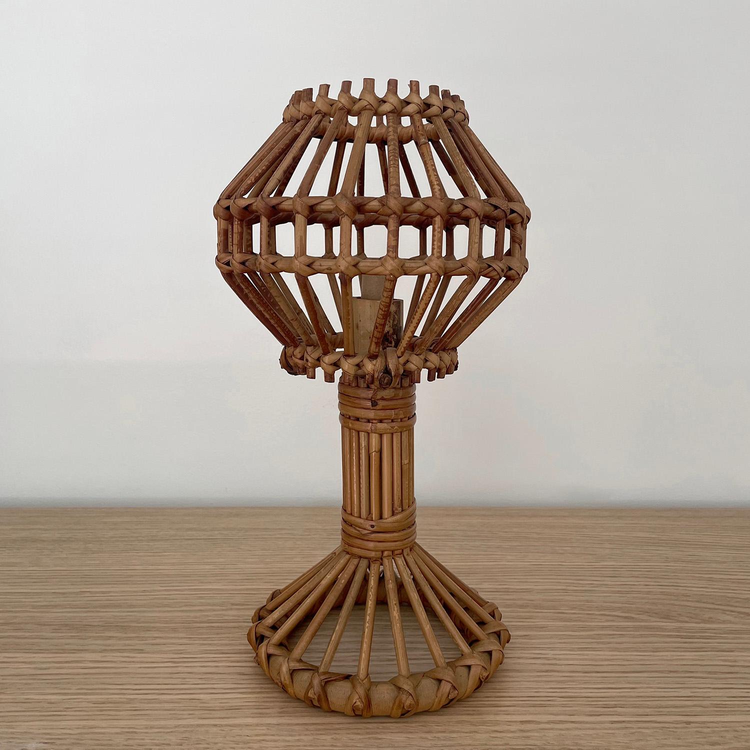 French rattan infinity lamp 
Beautifully sculpted rattan 
Natural color variations 
Illuminates light beautifully 
Newly rewired 
Silk french twist cord 
Single socket candelabra base
Last photo is for reference only 
Please see other listings 