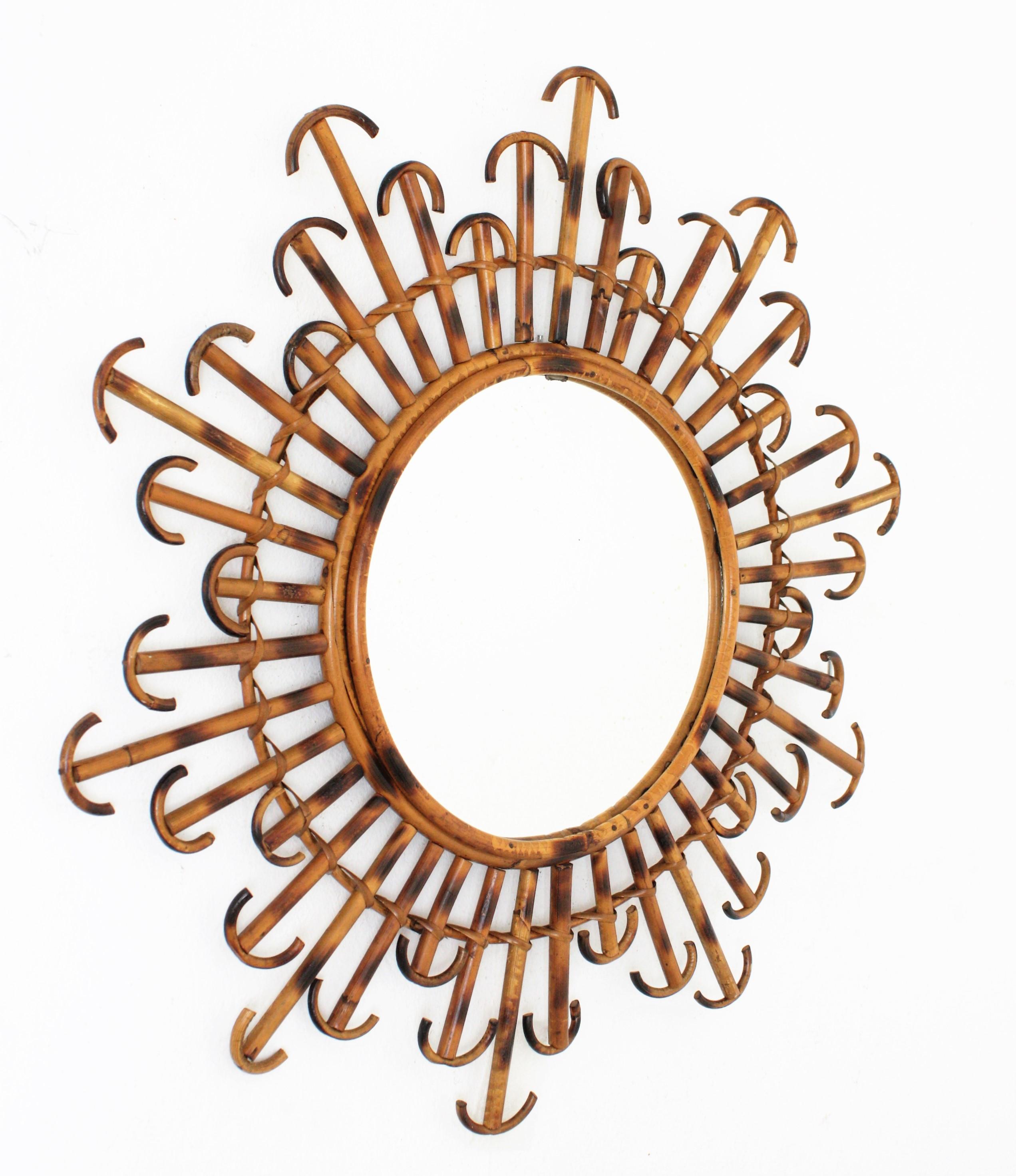 Mid-Century Modern French Rattan Wicker Sunburst Mirror with Curved Endings, 1950s