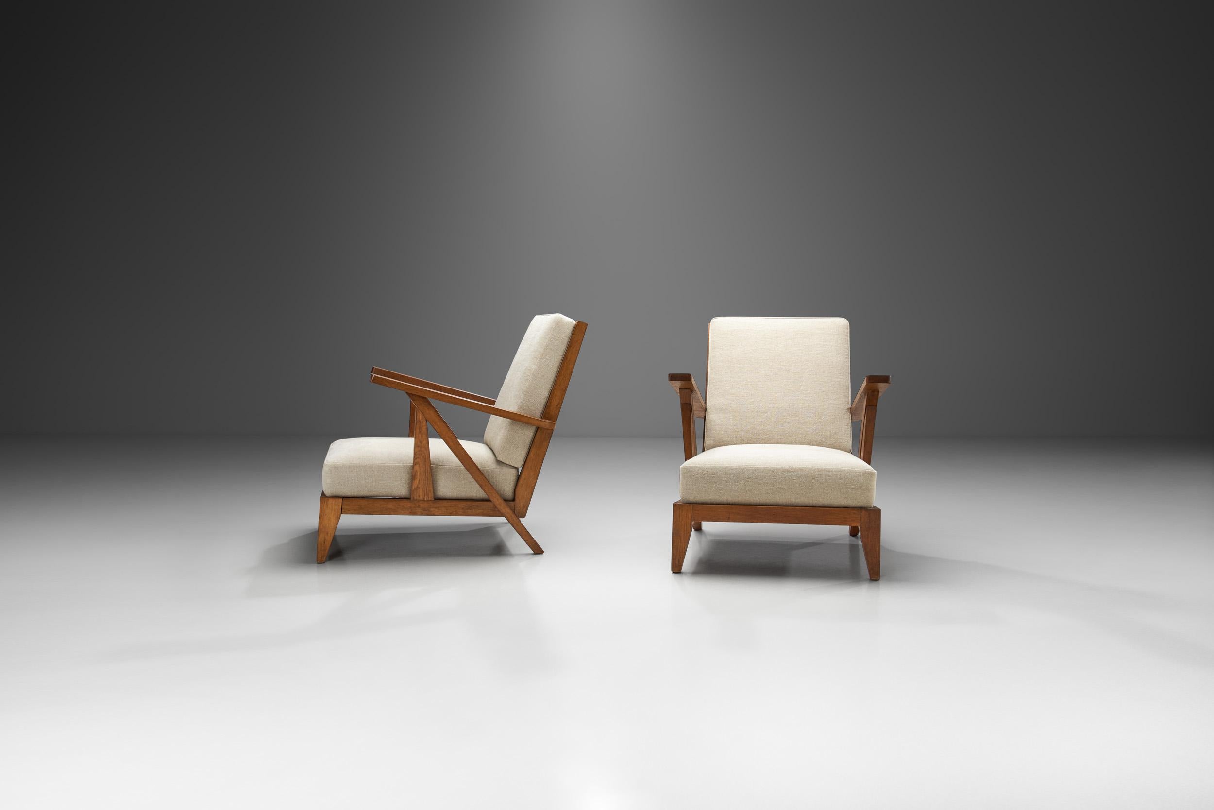 Mid-Century Modern French Reconsructivist Oak Lounge Chairs, France 1950s