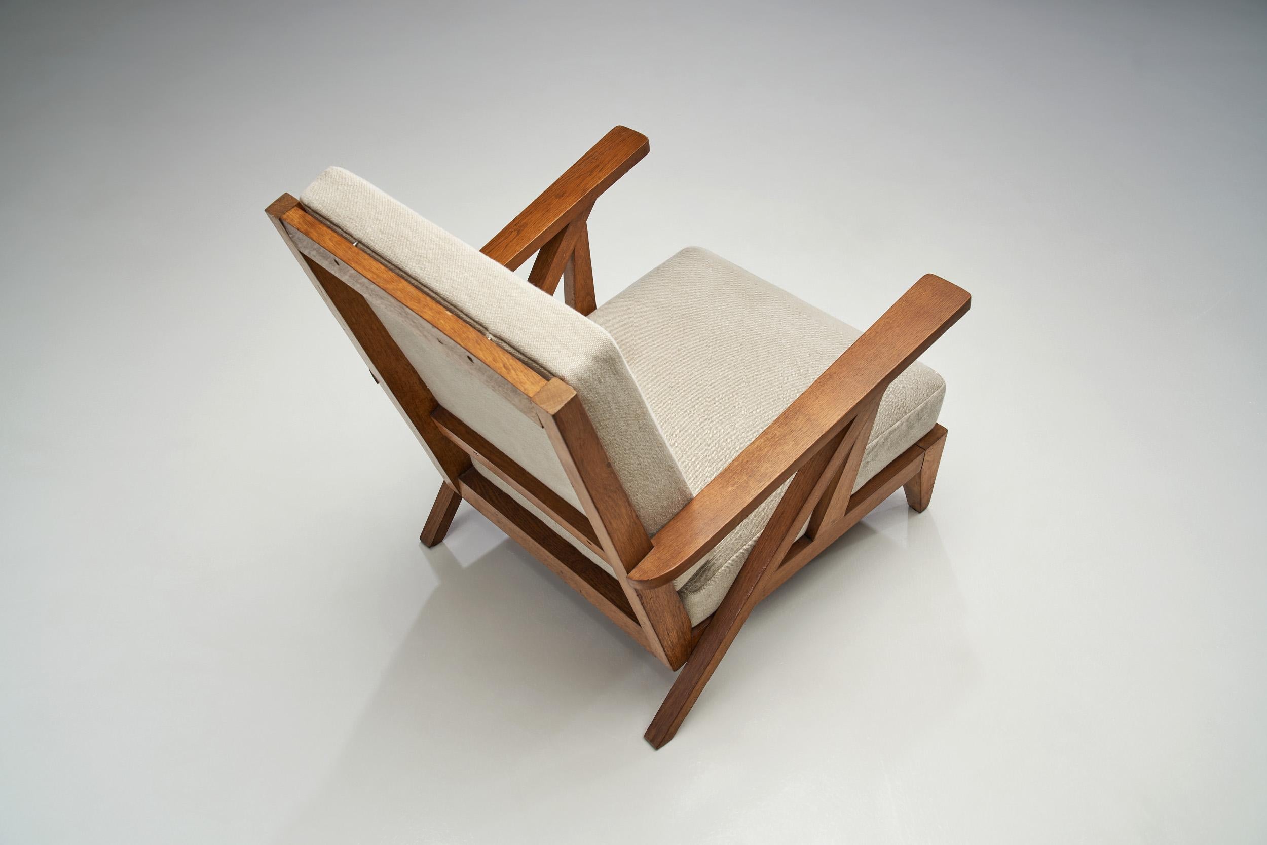 Mid-20th Century French Reconsructivist Oak Lounge Chairs, France 1950s