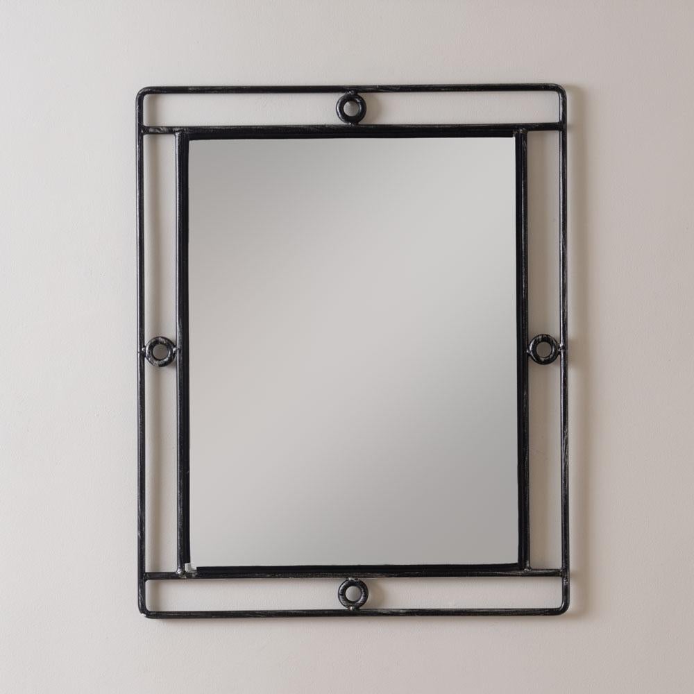 Beautiful iron mirror from France, 1950's. Large vintage rectangular iron frame with lovely spiral iron detail. Original iron finish and mirror show nice age and patina. Perfect for a powder room, bedroom vanity, or entryway. 