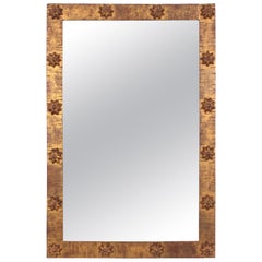 Specchio rettangolare francese in ferro battuto dorato con cornice a stelle, 1940