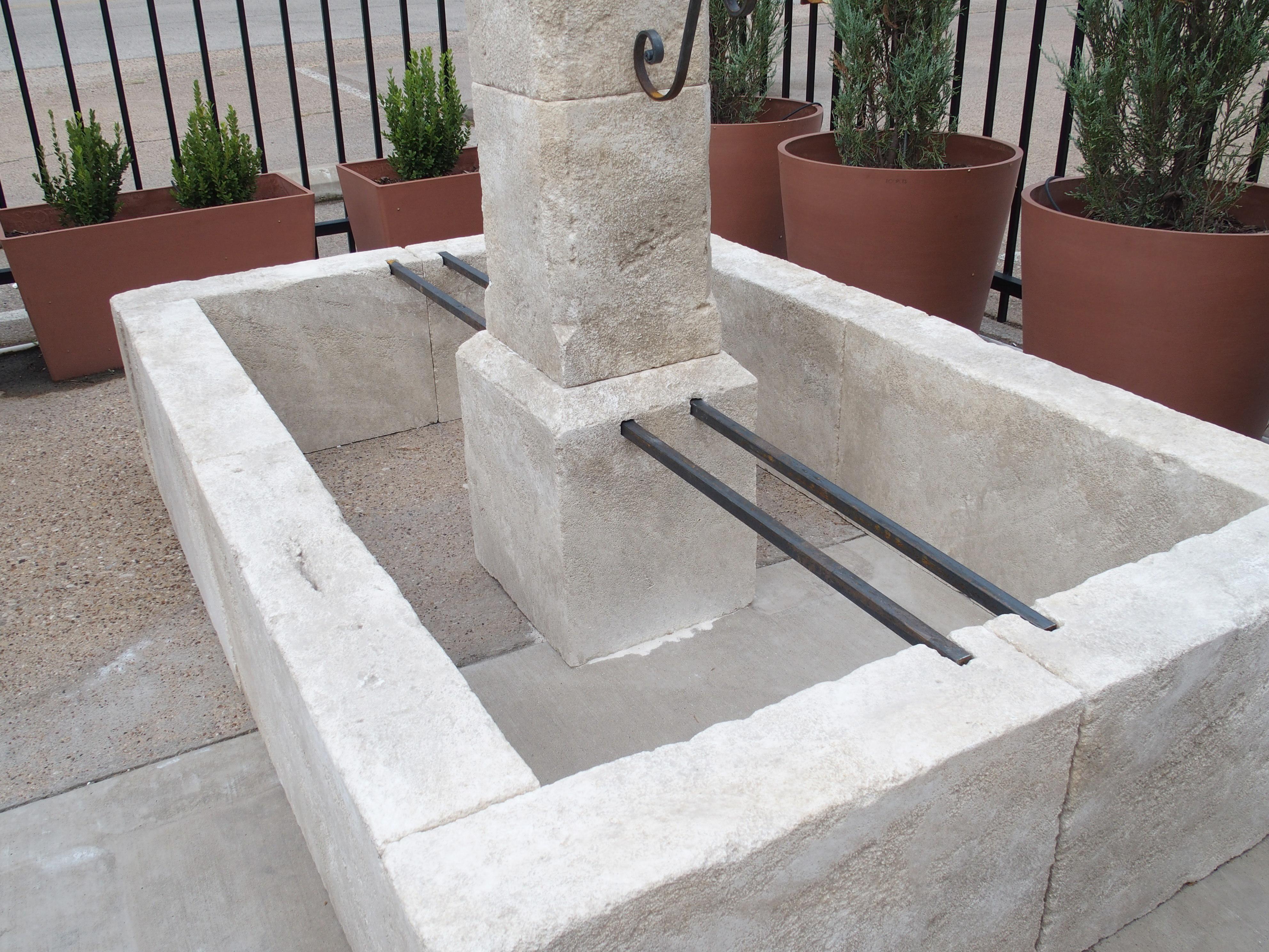 Hand-Carved French Rectangular Two Spout Center Fountain in Carved Limestone