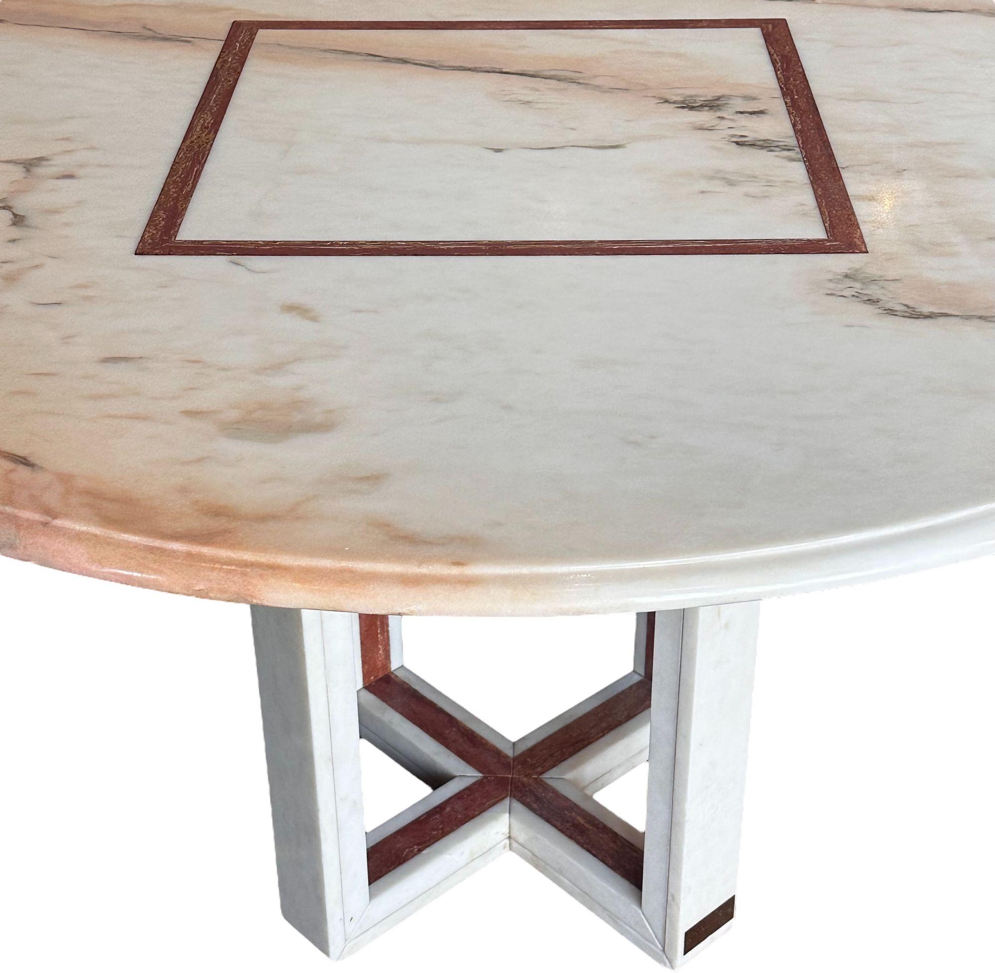 French Red and White Marble Center Dining Table, 1960. Cruciform Marble base and brass signature plate as shown in picture.
Measures 52