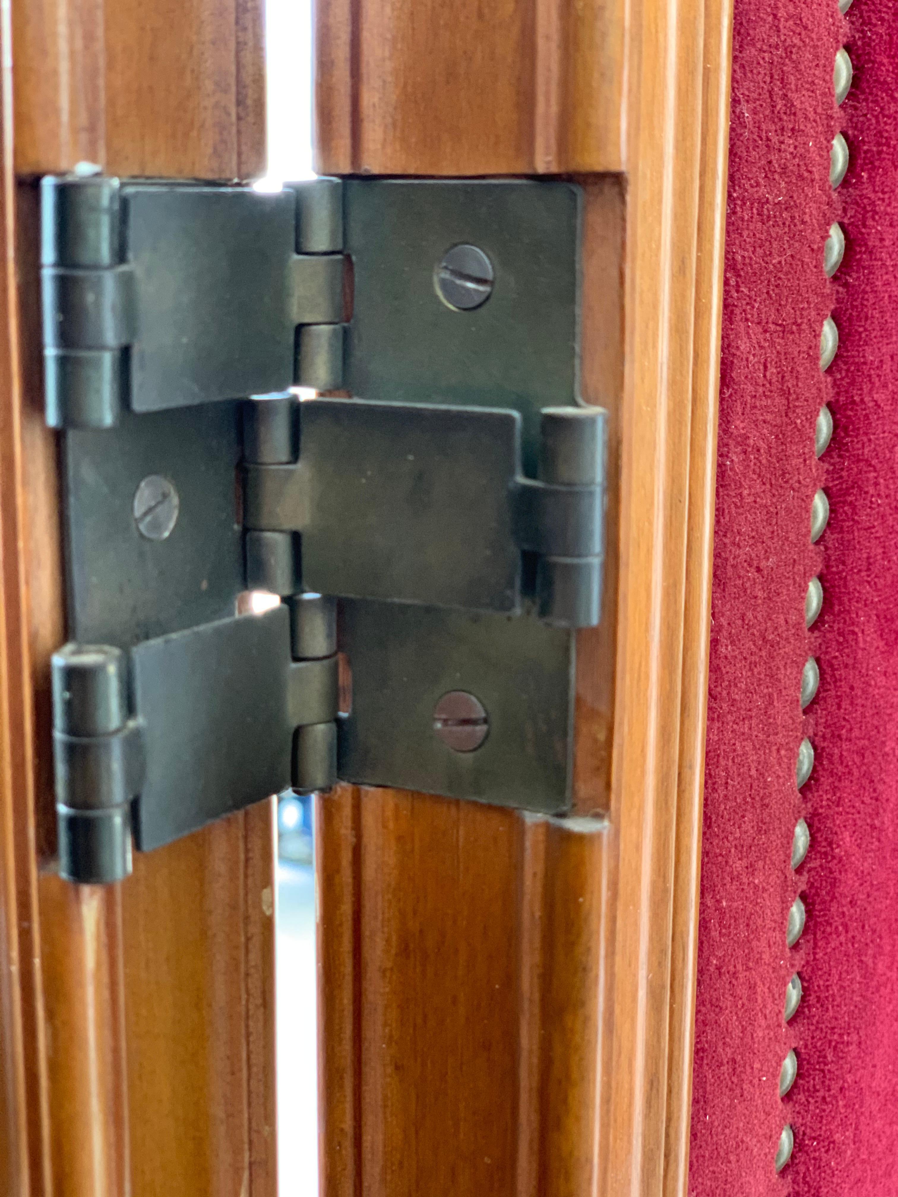 Hand-Carved French Red Velvet Three-Panel Screen Adorned with Antique Brass Tacks