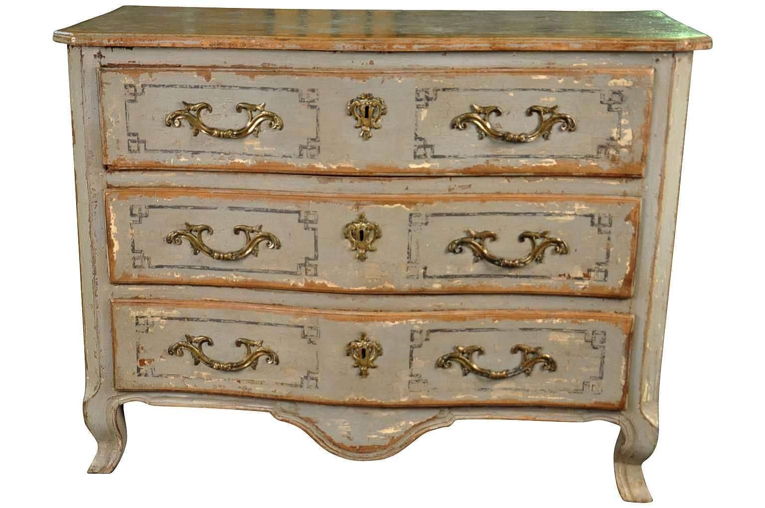A very lovely French Regence period 18th century commode from the Lyon region of France. Wonderfully constructed with a gentle Arballette form, shaped surface over three drawers. Striking painted finish. A wonderful addition to any living or bedroom
