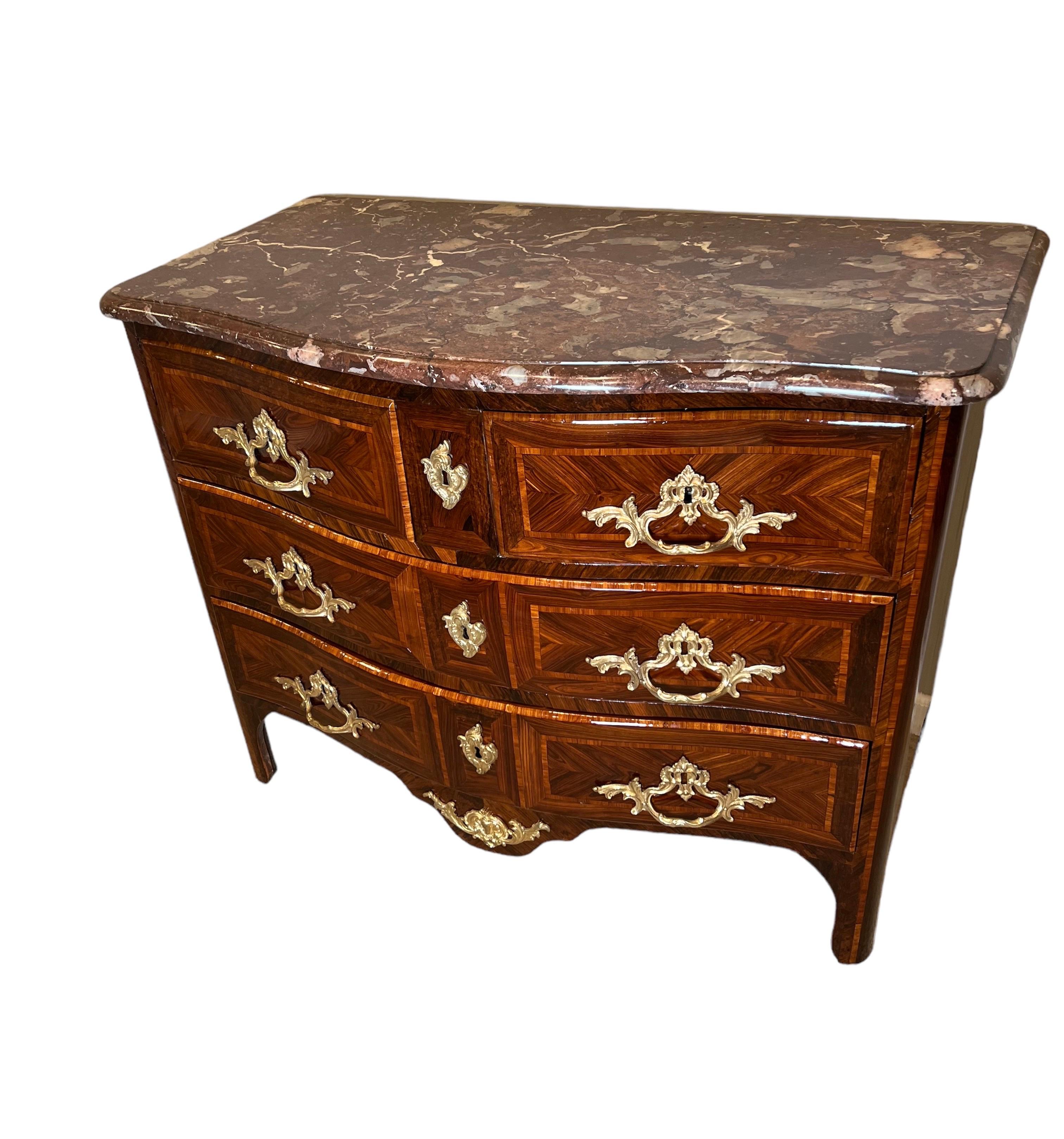 French Régence Ormolu-Mounted Rosewood & Kingwood Inlay Rouge Marble Top Commode, sign. J.F. LAPIE (Jean François Lapie ) , with guild stamp, Paris circa 1730. Tulipwood, rosewood and partly dyed precious woods in veneer and inlaids, centrally