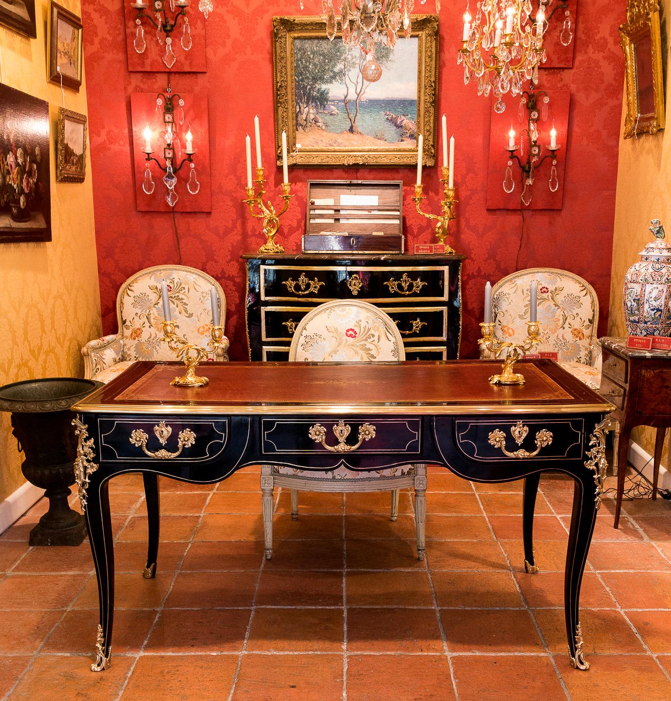 French Regence period, black-lacquered flat desk with gilt bronze and brass decoration, circa 1715-1723.

The Regence period furniture is rare; the period is short and at the same time very rich in the desire to change Decorative Arts. Our