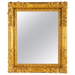 French Regence Period Carved and Giltwood Mirror, circa 1720