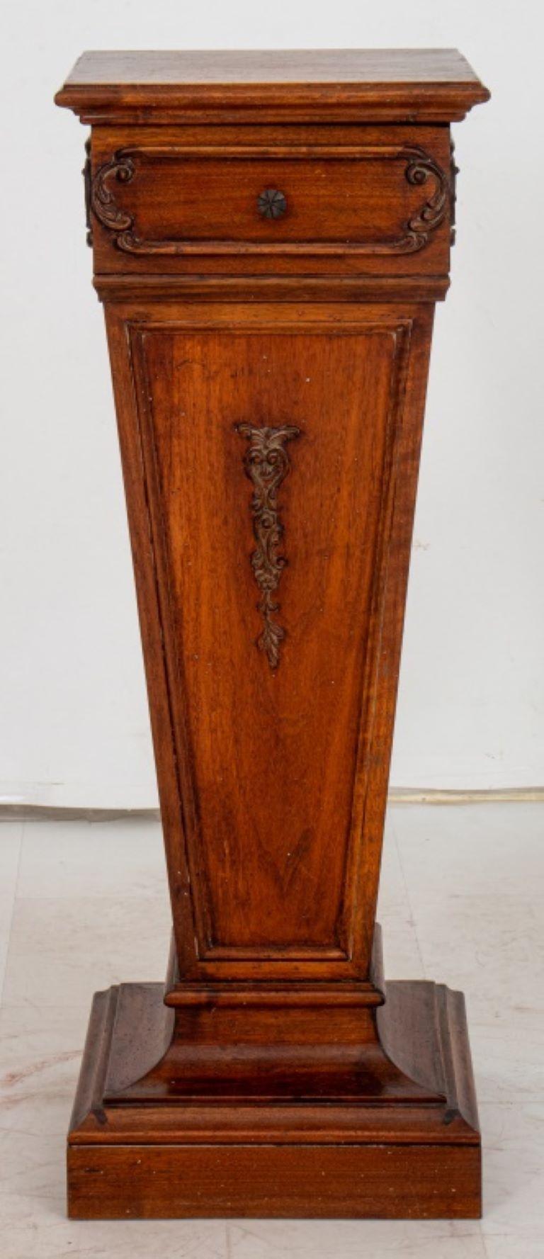 Regence style carved wood pedestal, the square top above a tapering support on a molded square plinth. 

Dealer: S138XX