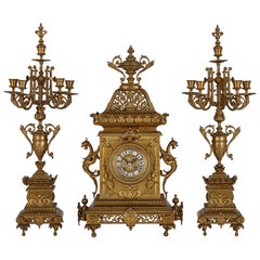 French Régence Style Gilt Bronze Clock Garniture